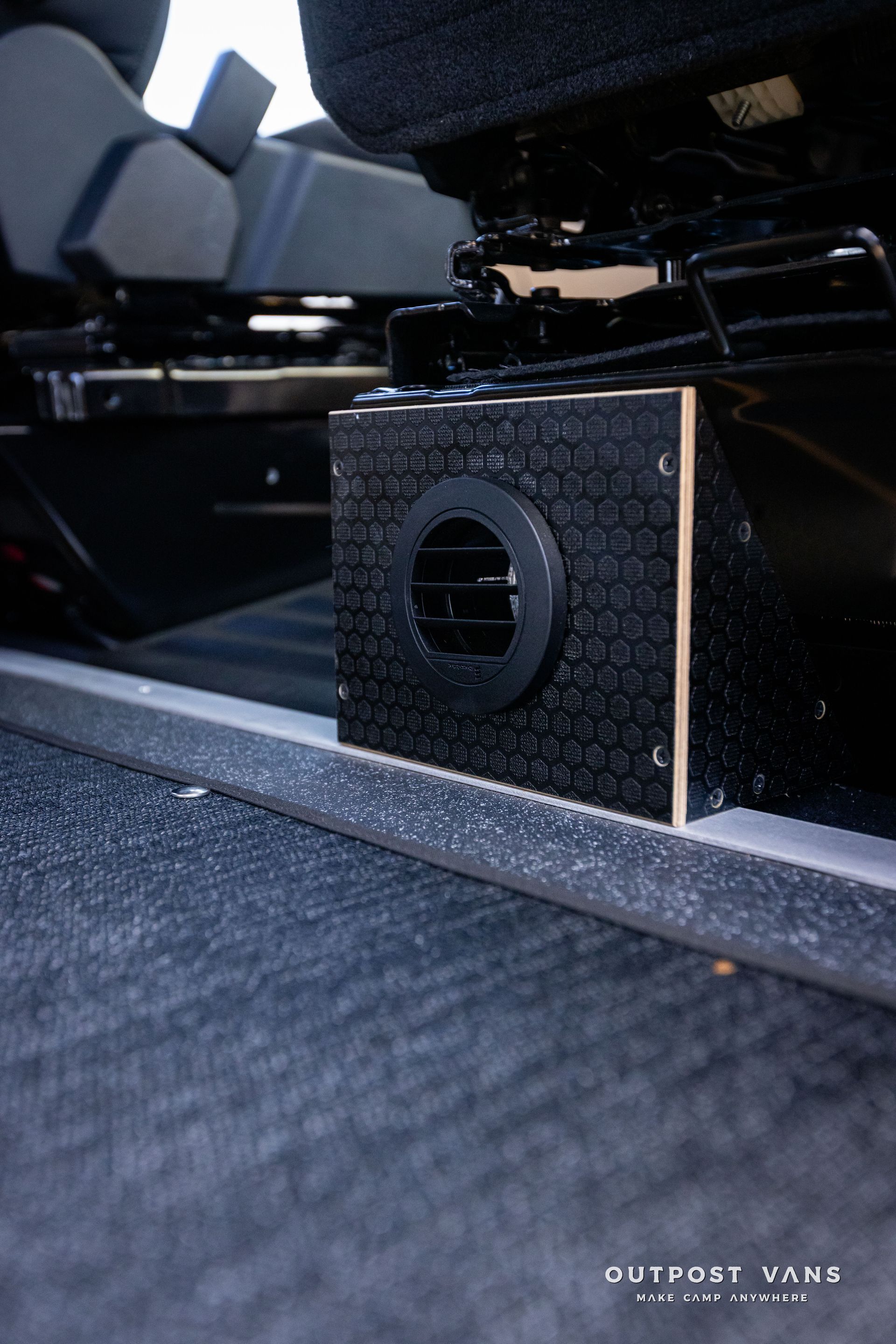 Outpost Vans custom built camper van Ford Transit 148 AWD. custom vent for espar gas heater