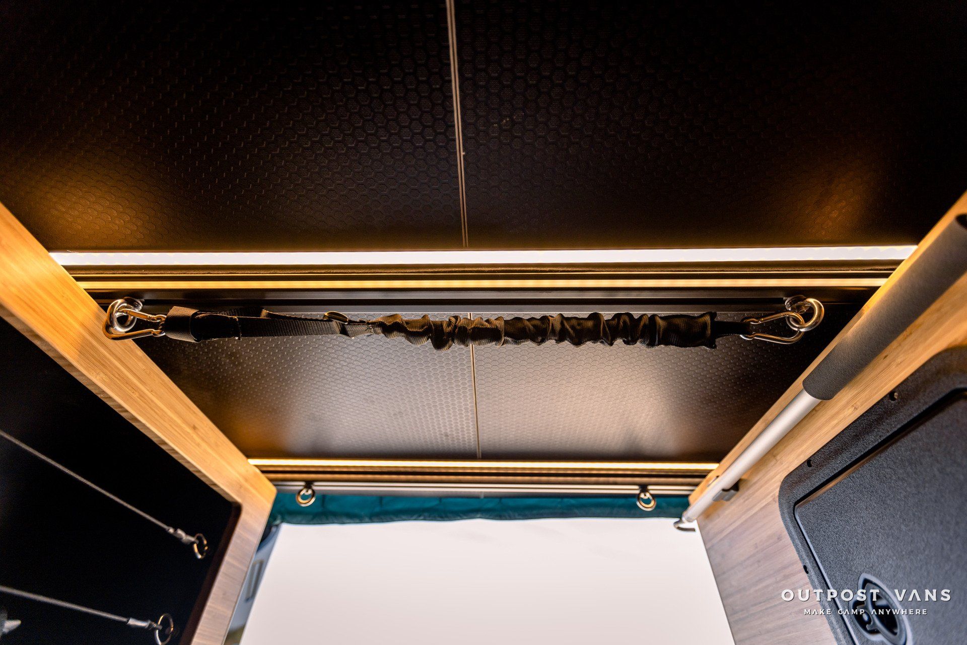 The ceiling of a camper van has a light on it