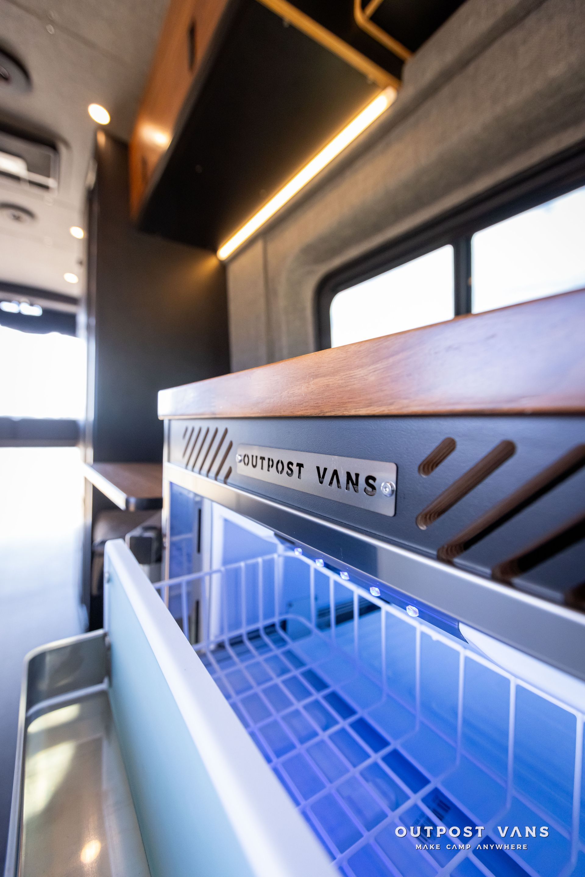 Outpost Vans custom built camper van Ford Transit 148 AWD.