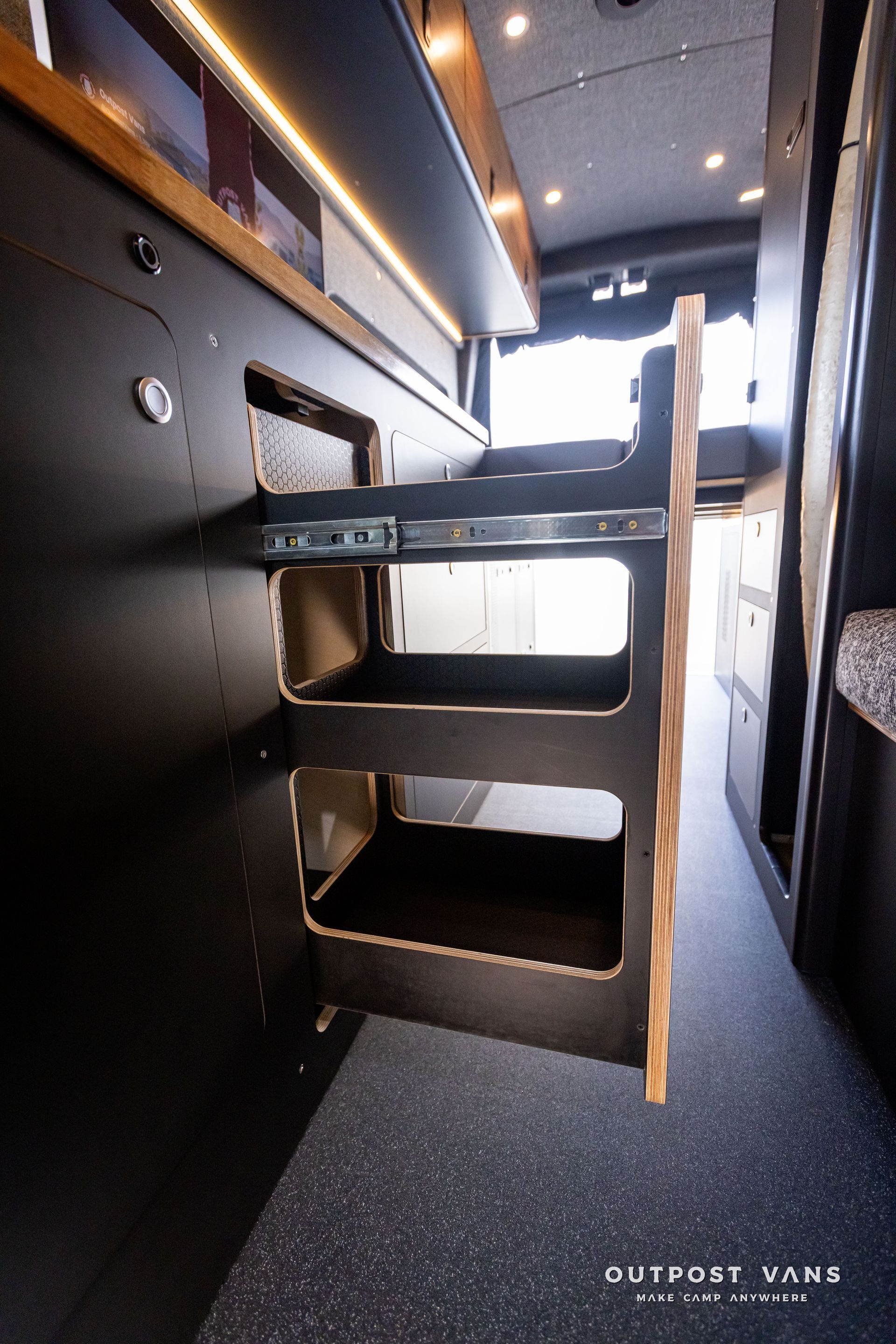 Outpost Vans custom built camper van Ford Transit 148 AWD. pantry drawer.