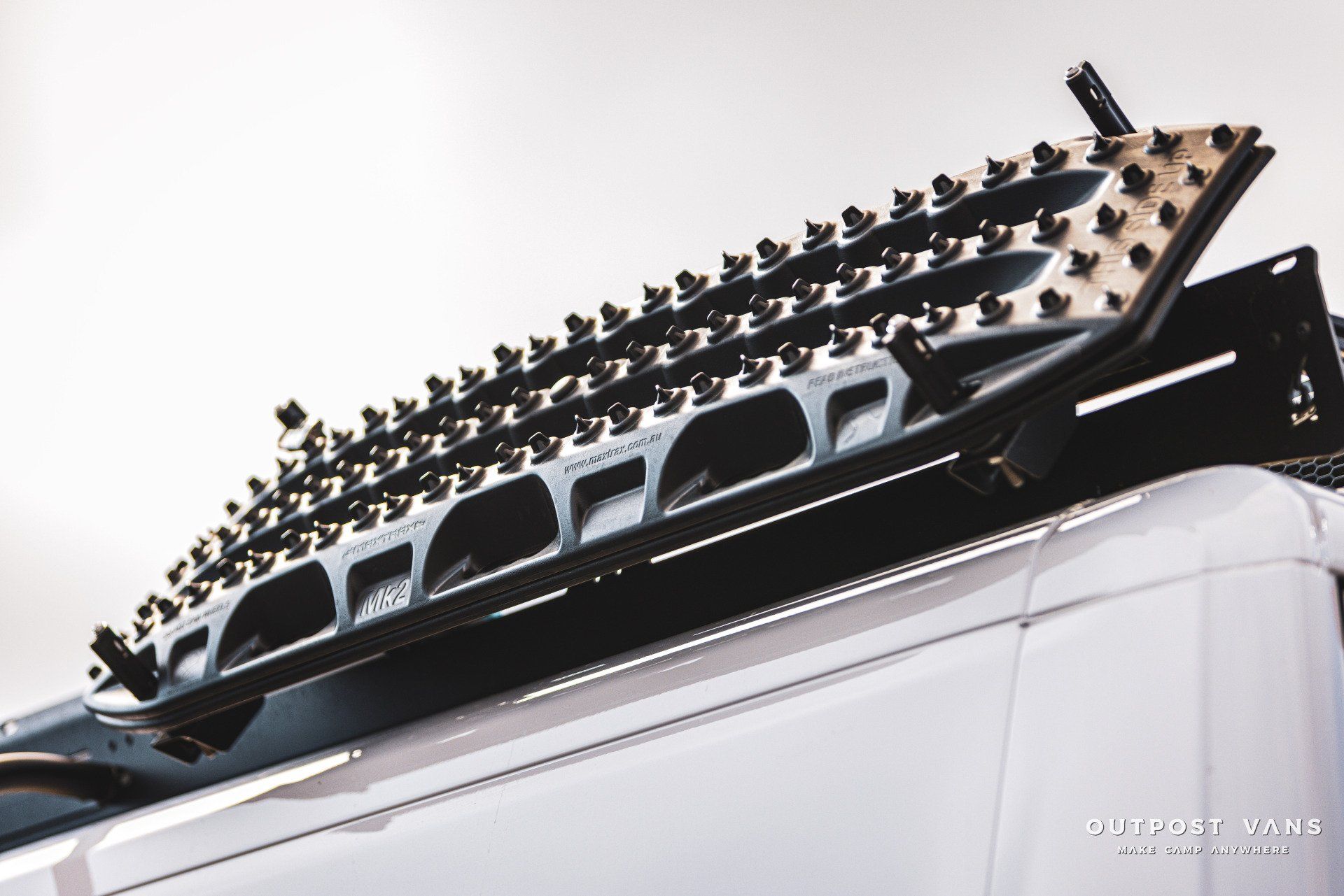 a close up of a roof rack on a white van