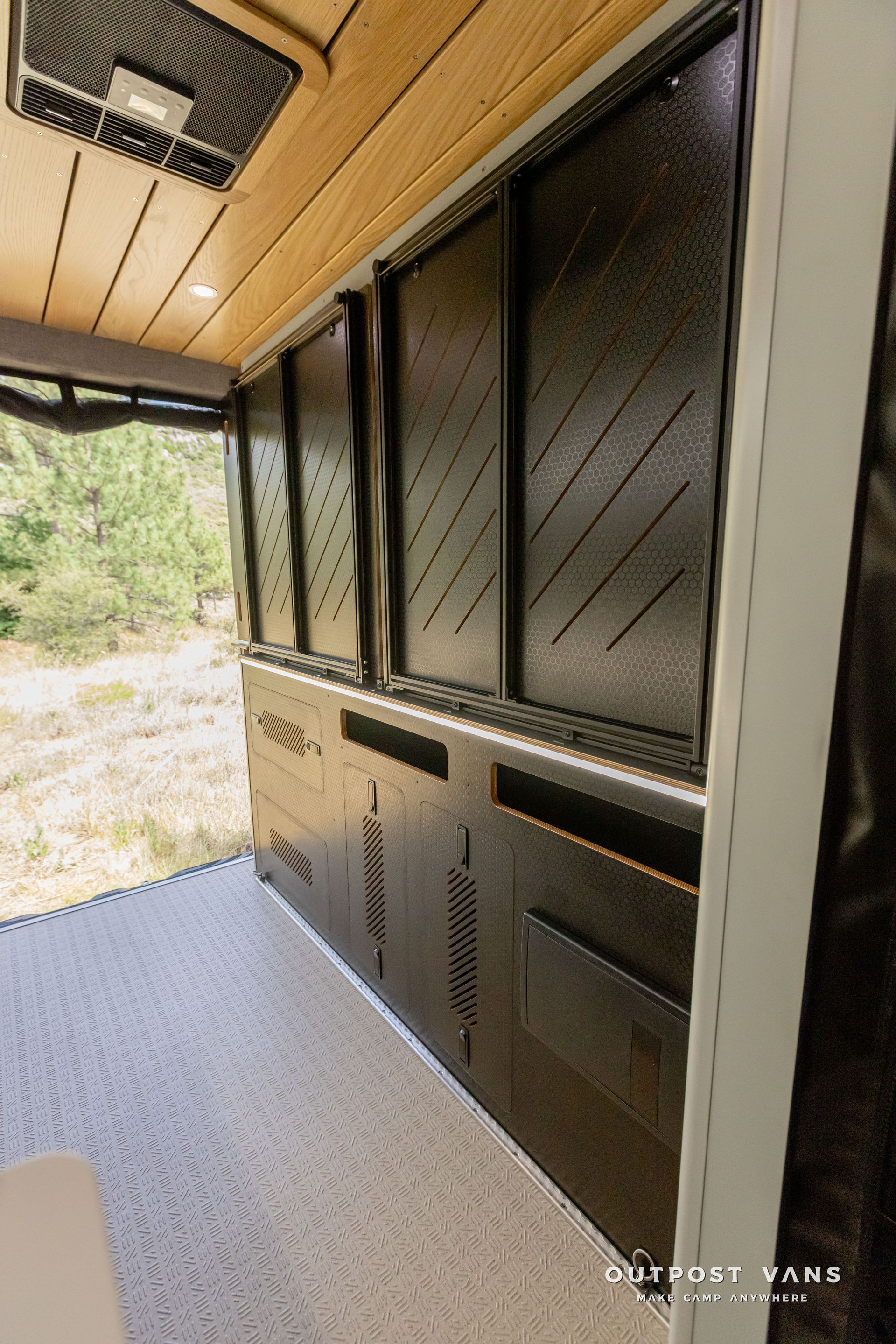 murphy bed system.  Outpost vans Sprinter 170 AWD.