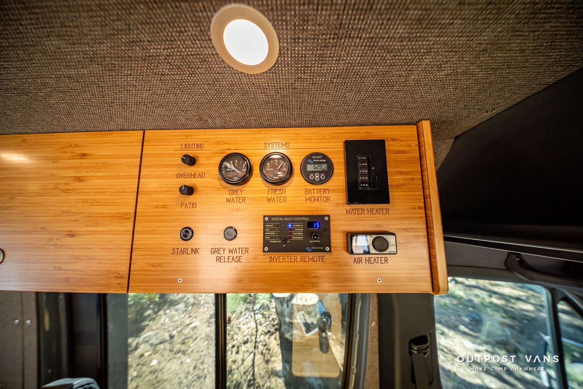 Sprinter Wooden cabinet with gauges and switches in a van.