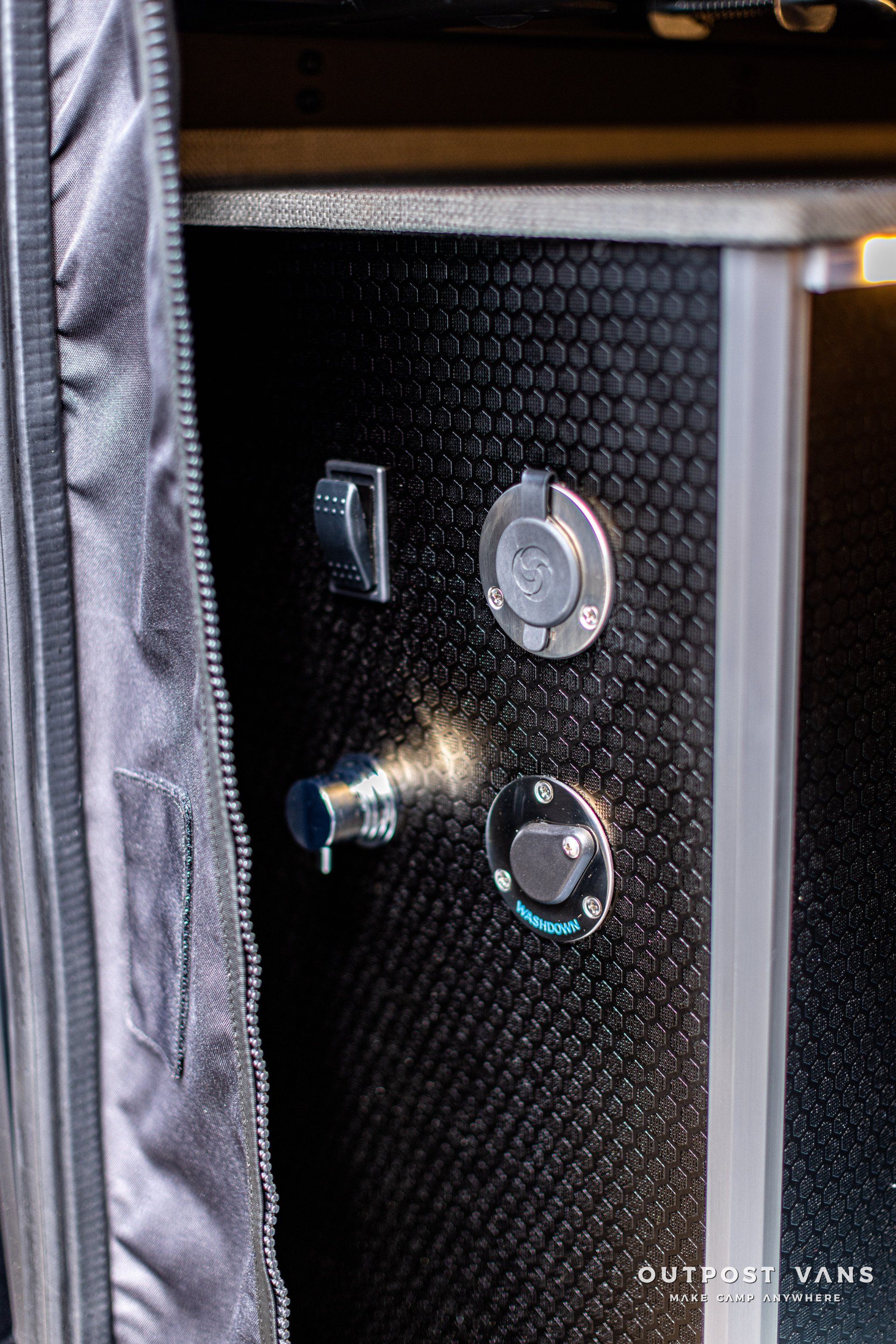 a close up of a door with a few buttons on it .