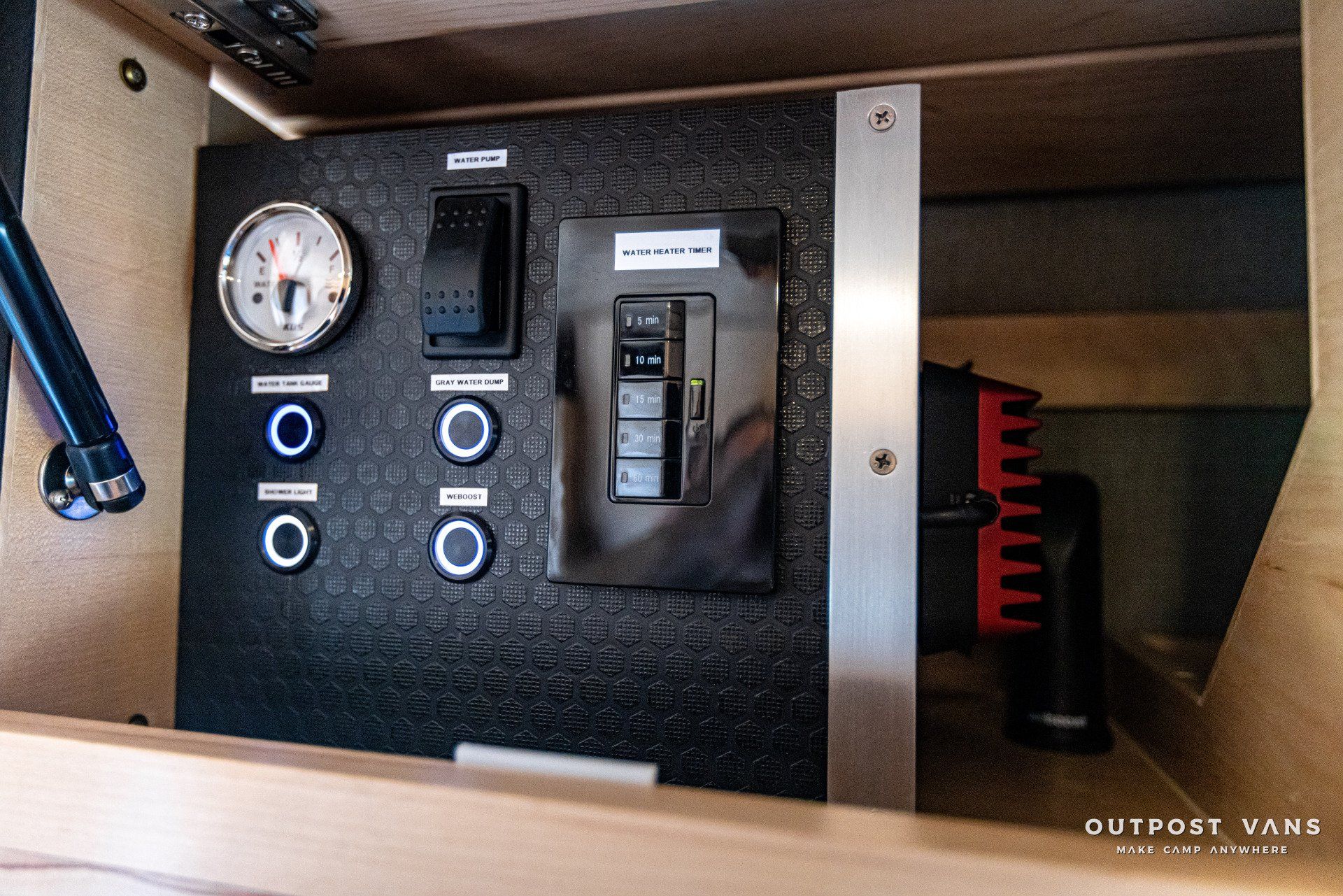 A box with a switch and a clock on it