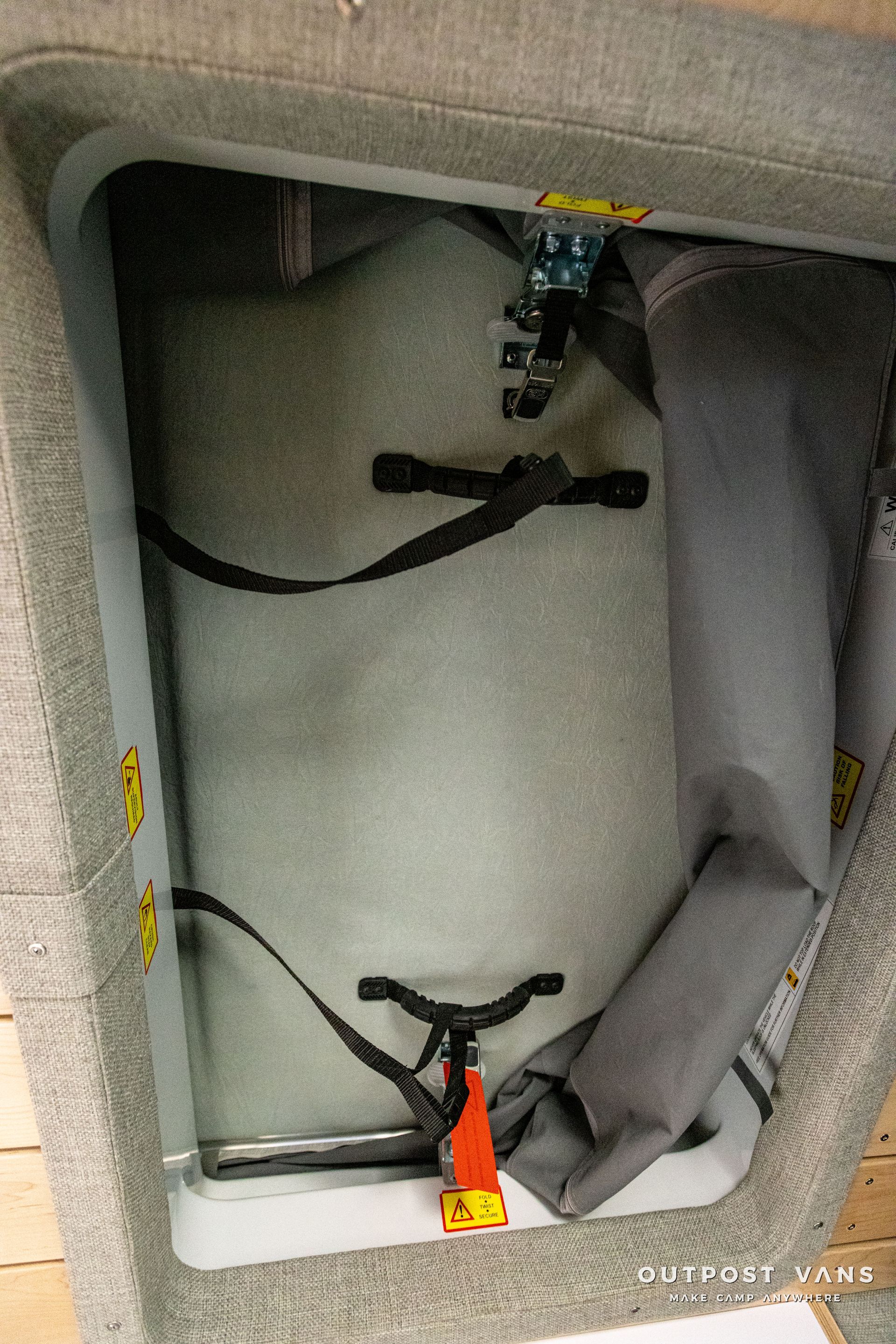 the inside of a boat with a pump in it .