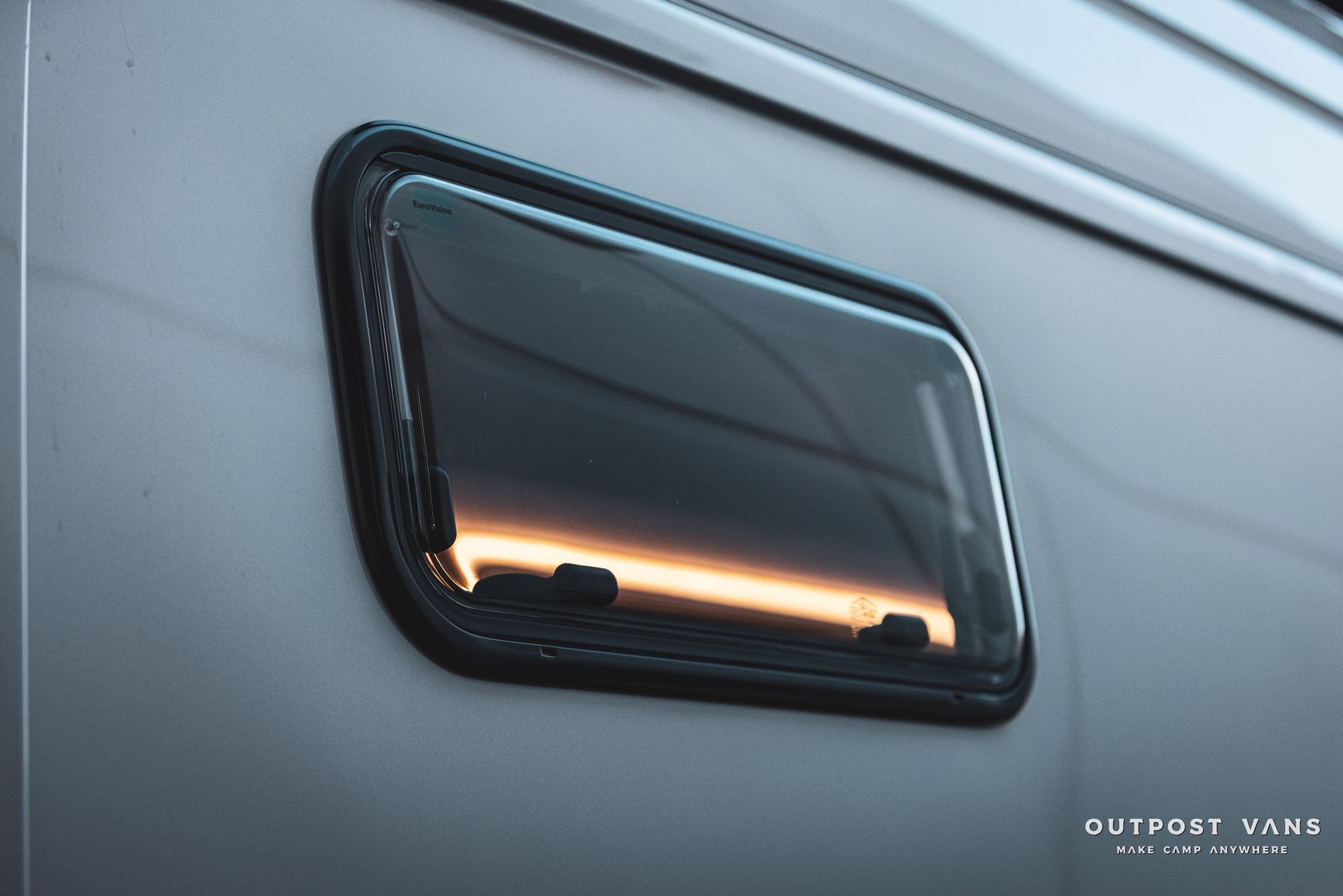 a close up of a window on the side of a van