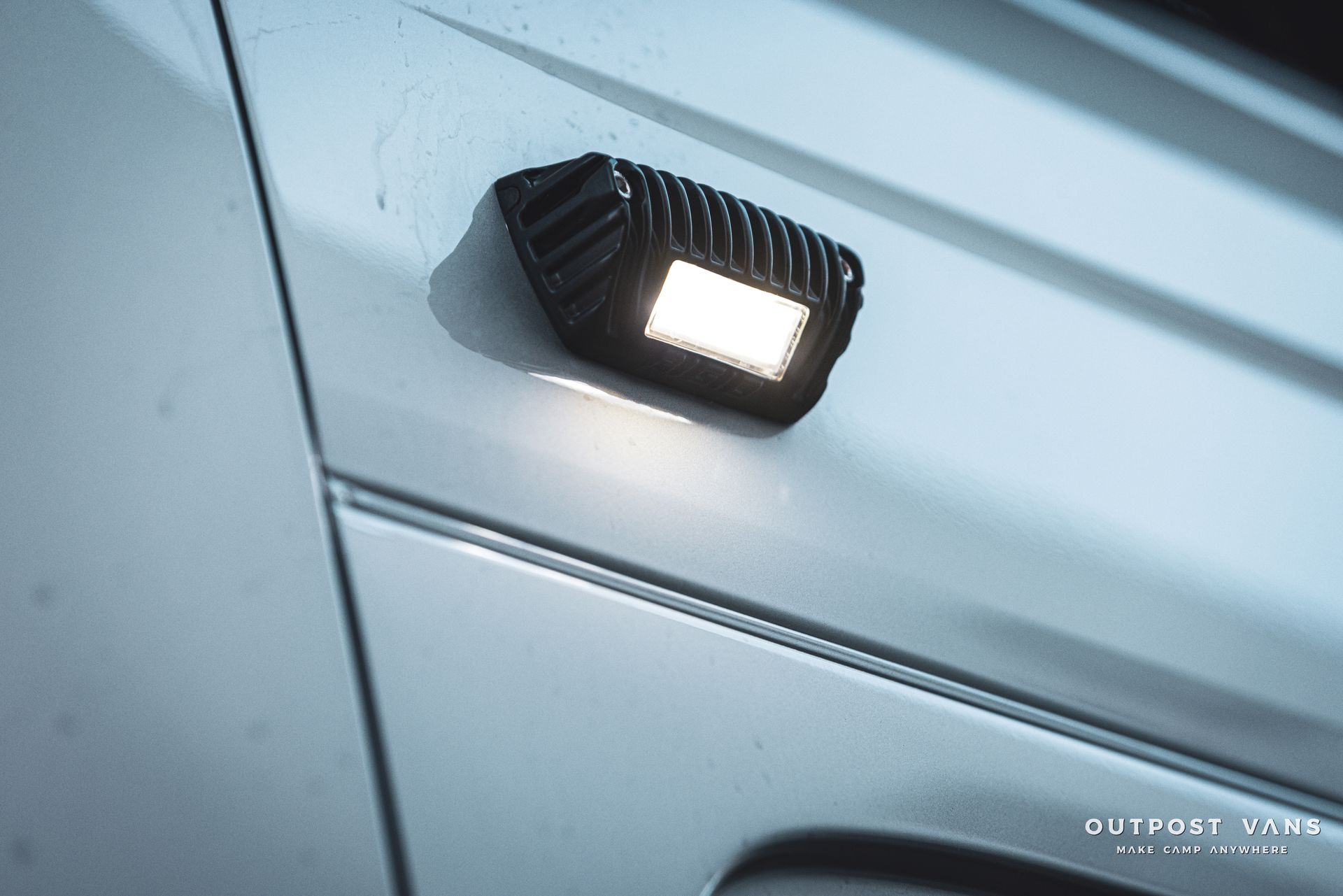 a close up of a light on the side of a car