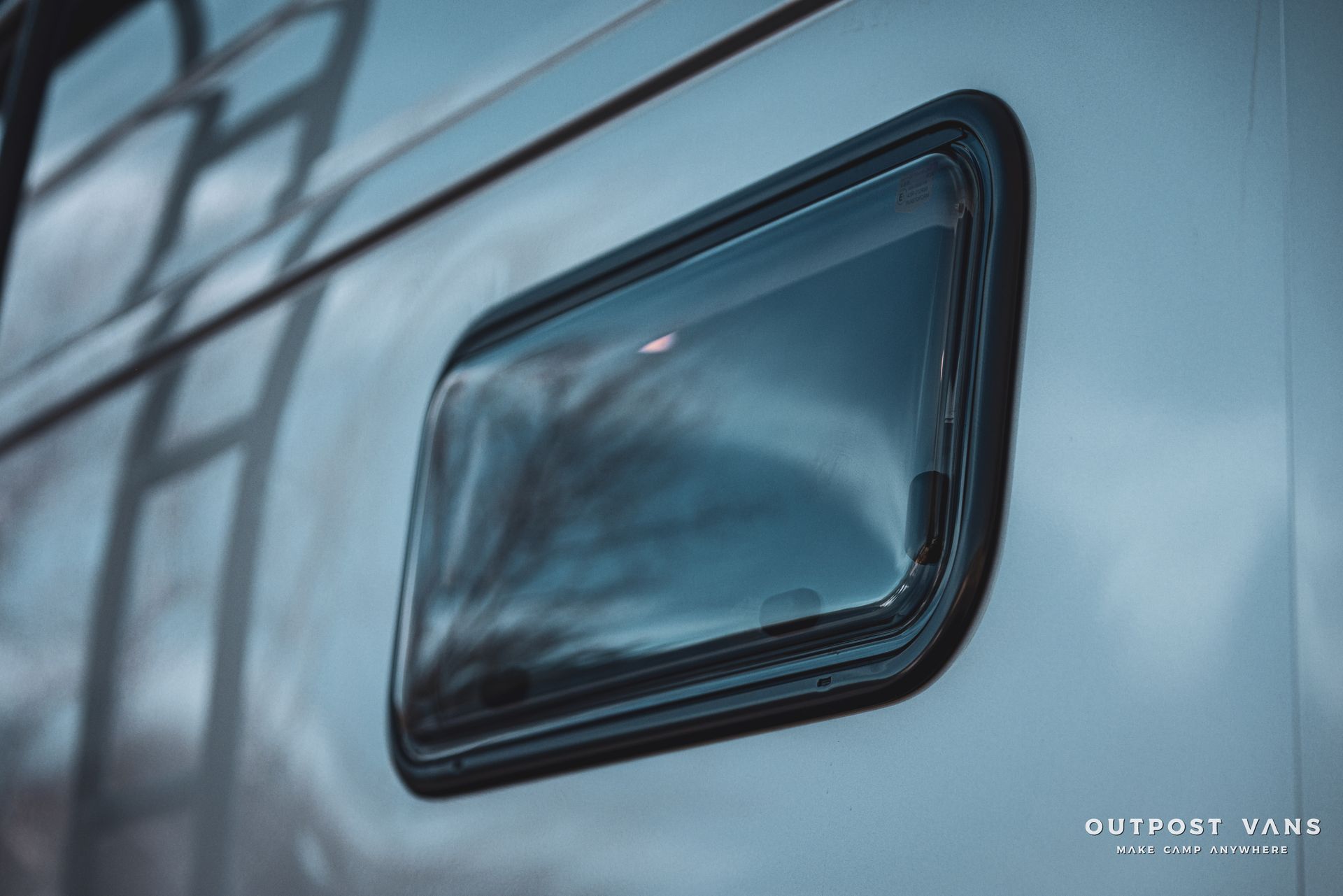 a close up of a window on the side of a van .