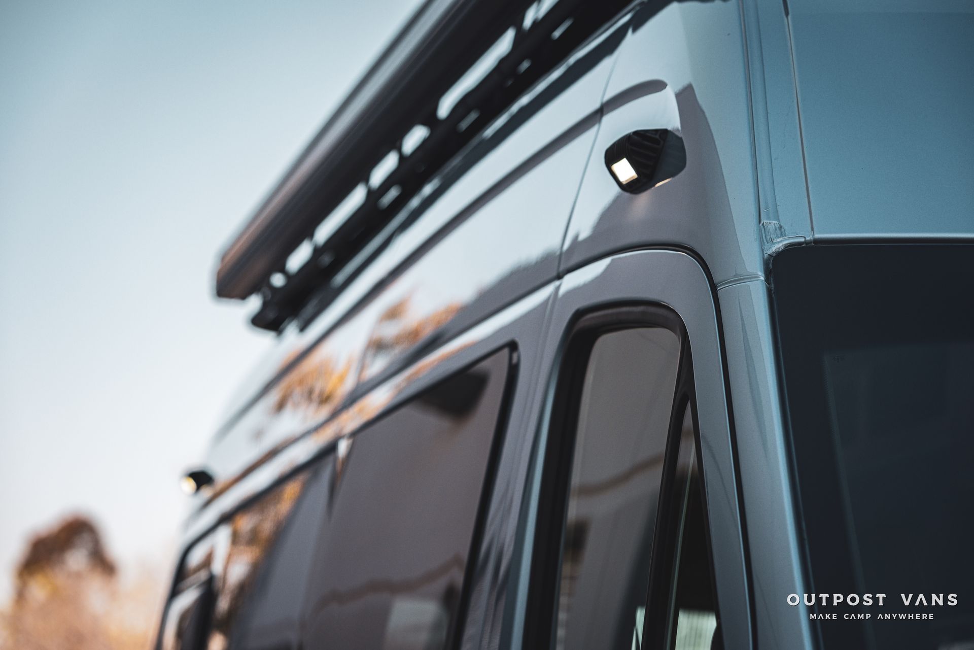 a close up of a van with a awning on top of it .