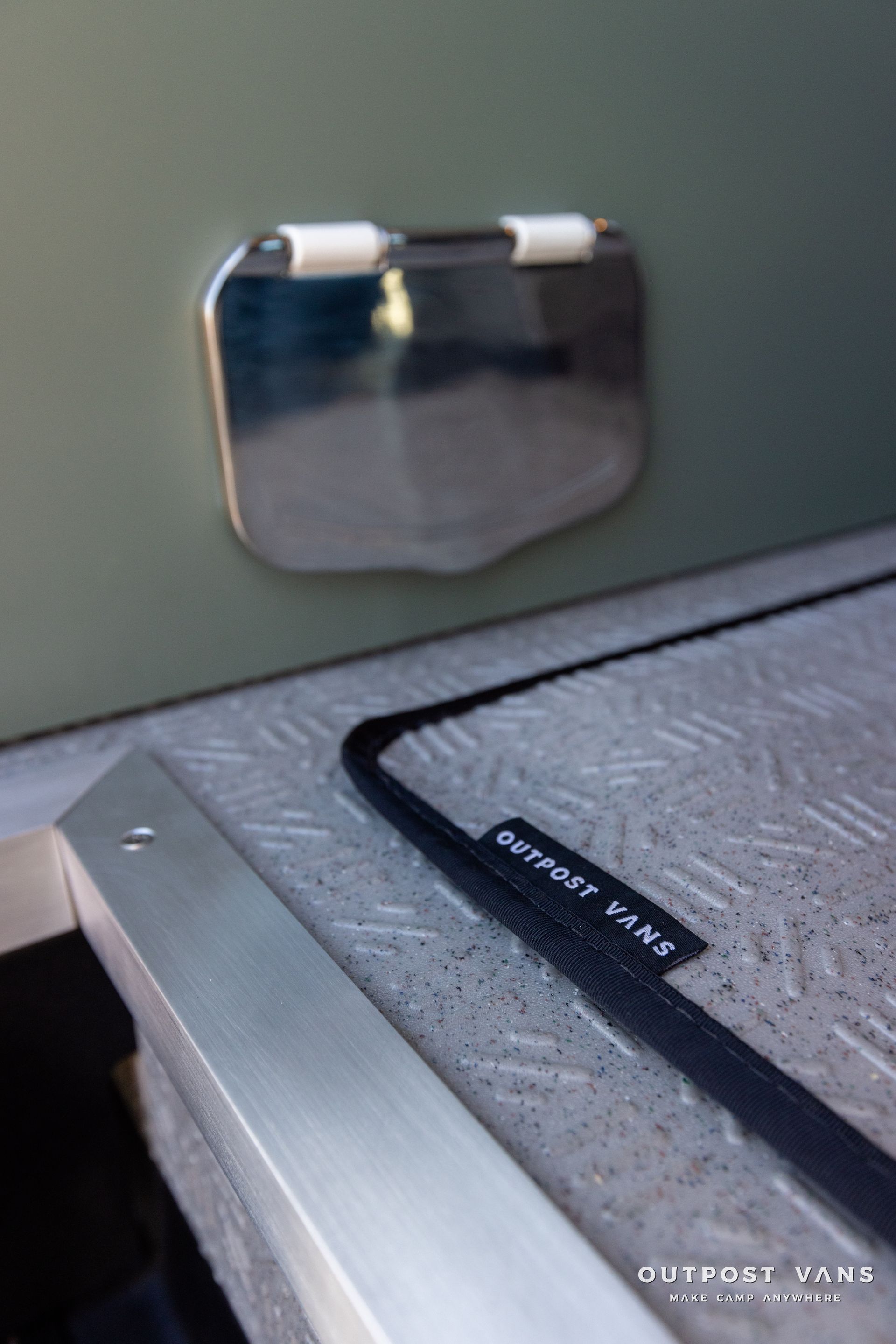 a close up of a metal item on a table .