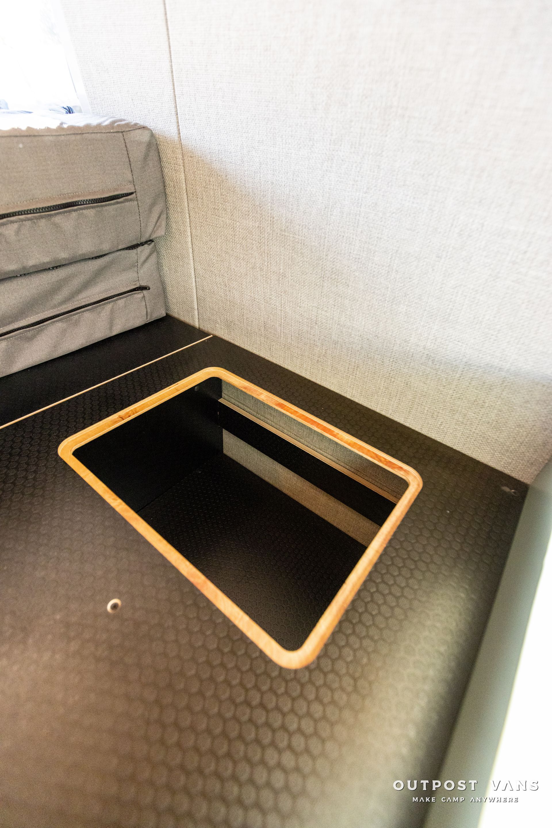 a black counter top with a small sink in the middle of it .