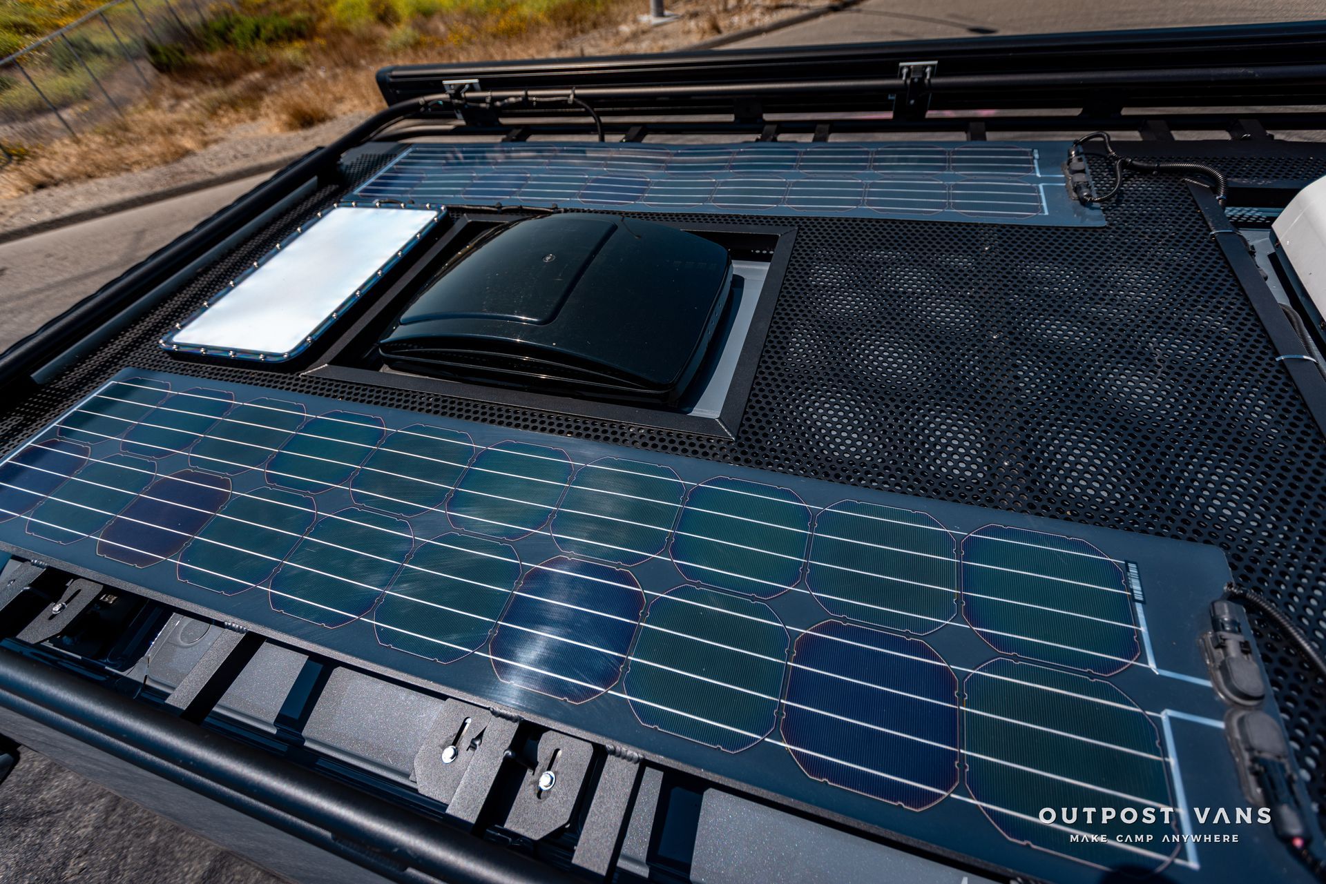 a close up of a roof rack with solar panels on it .