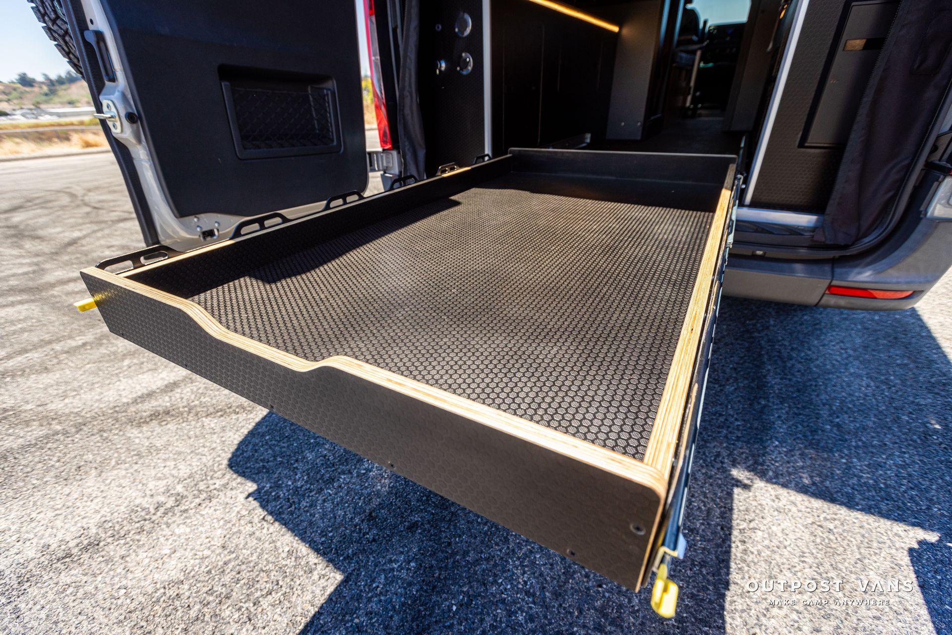 A van with a ramp in the back of it.