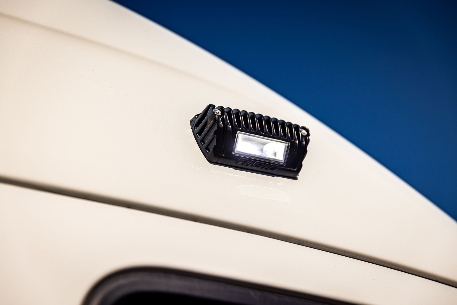 A close up of a light on the side of a vehicle