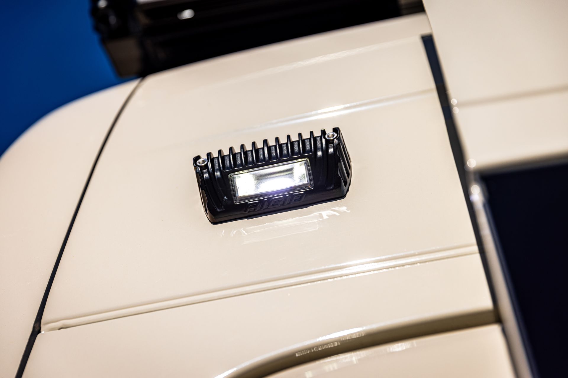 A close up of a light on the side of a car.