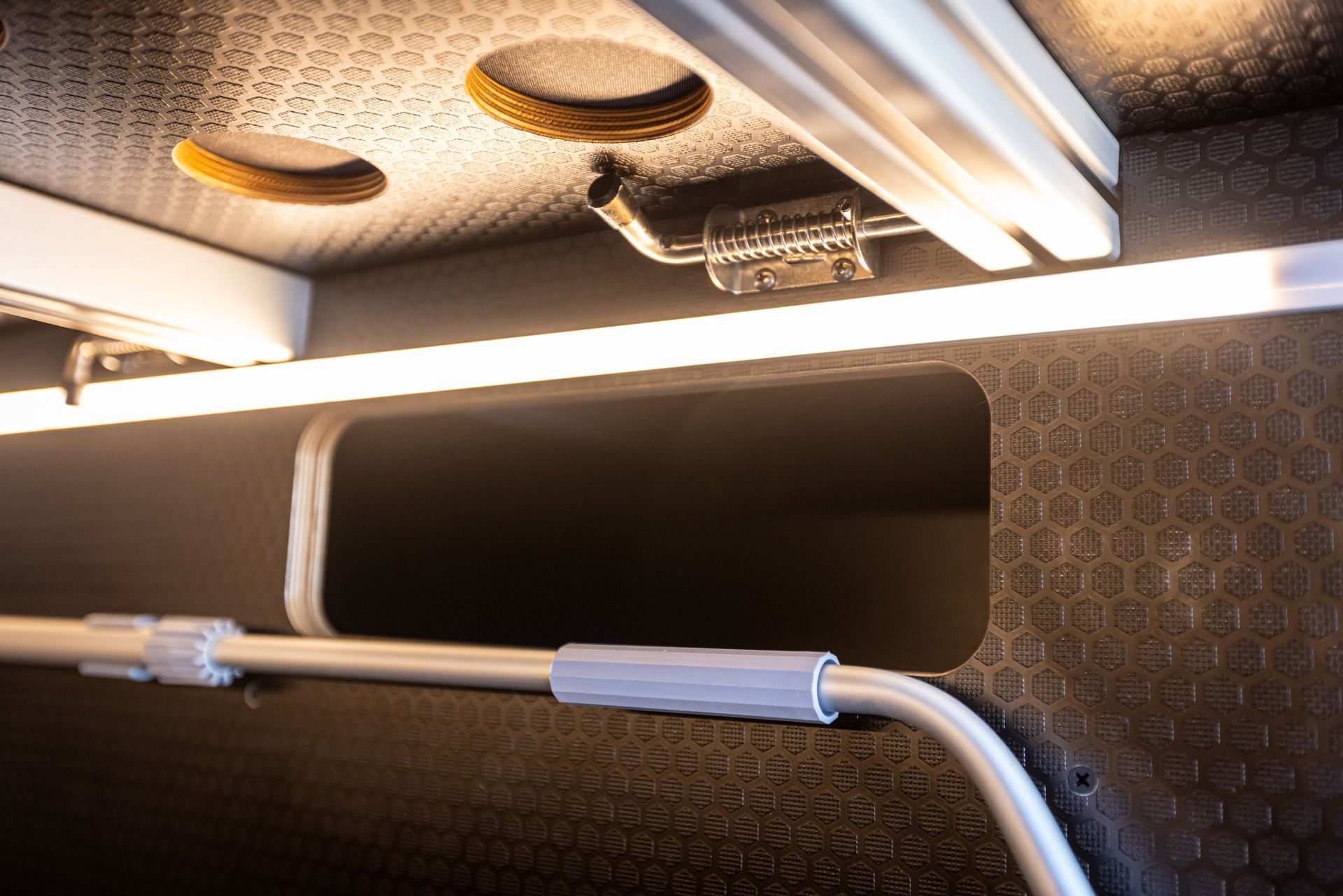 a light is hanging from the ceiling of a room