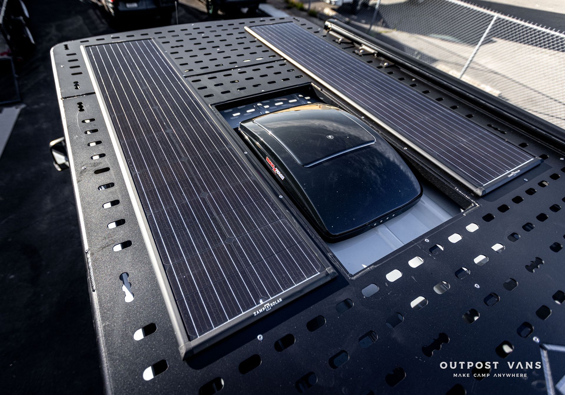 a roof of a van with solar panels on it