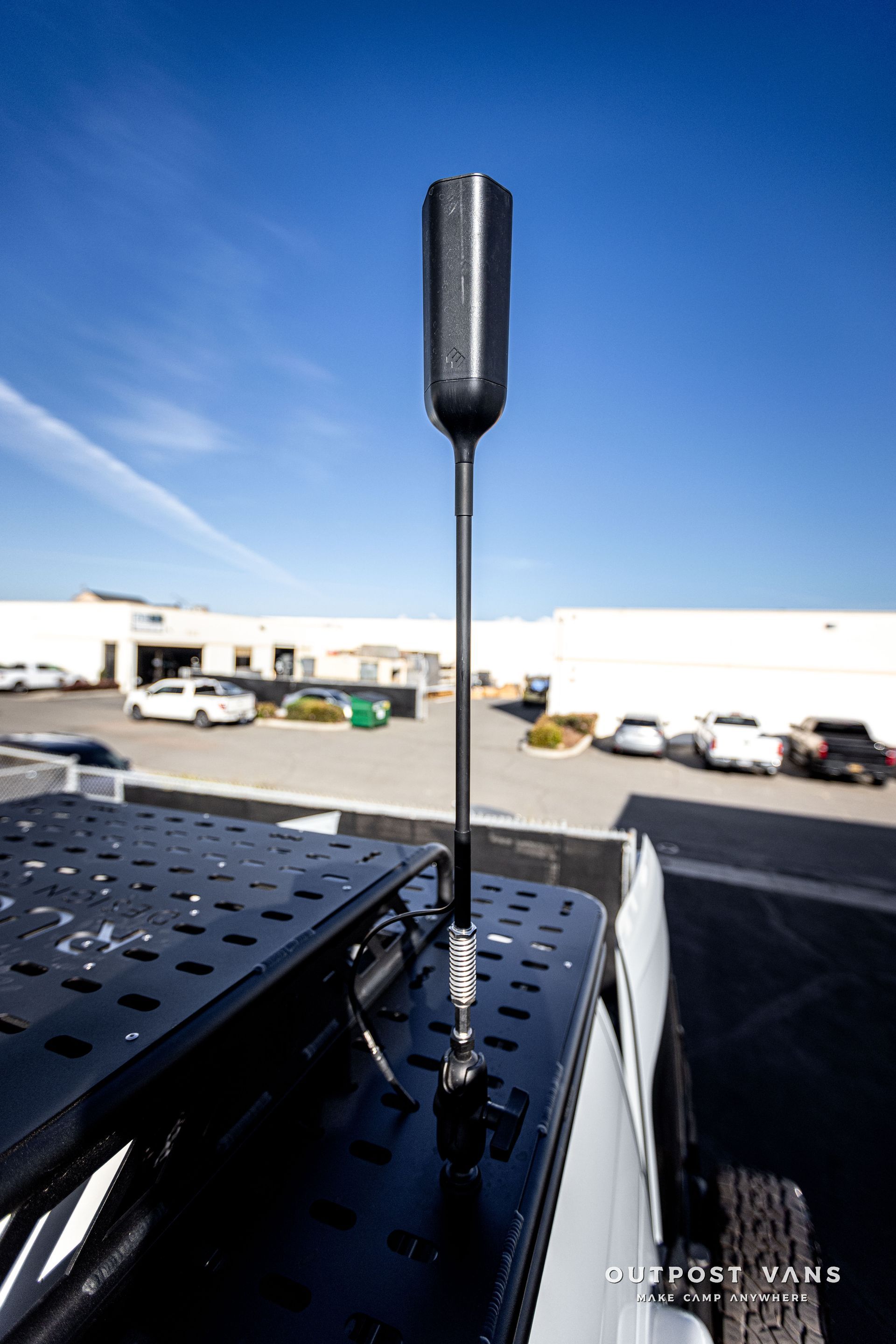 a close up of a antenna on the back of a truck .