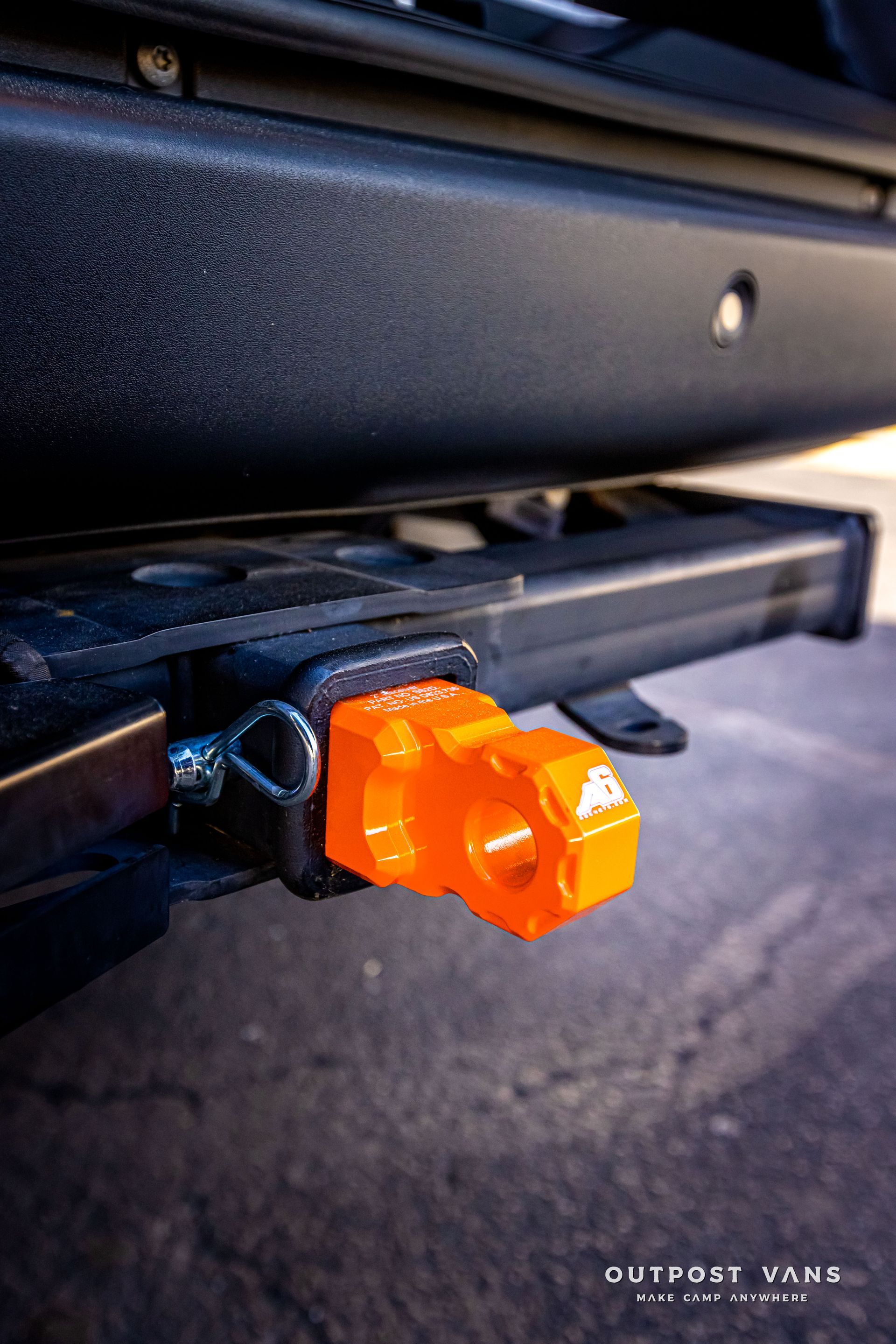 a close up of a tow hook on the back of a truck .