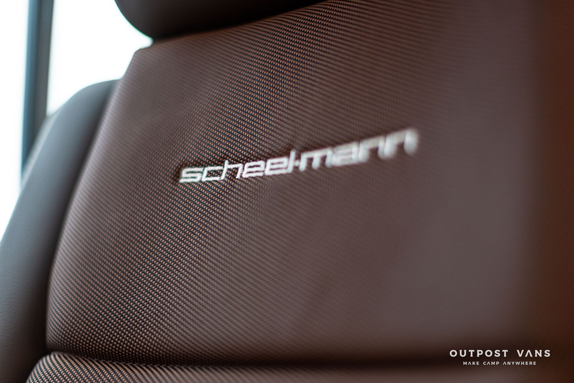 A close up of a car seat with the word scheelmann on it