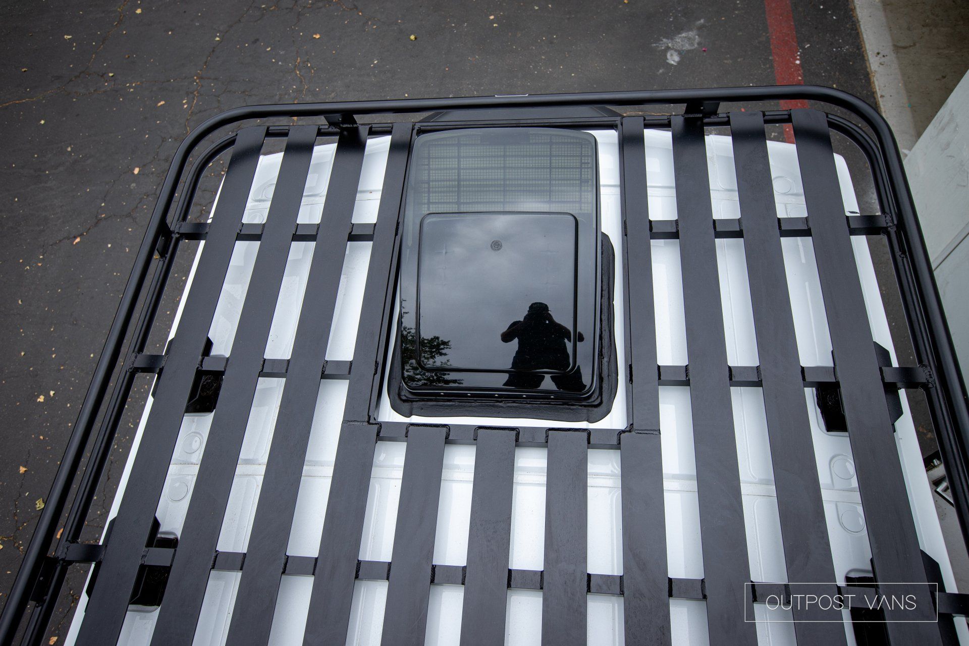 a roof rack with a window on top of it