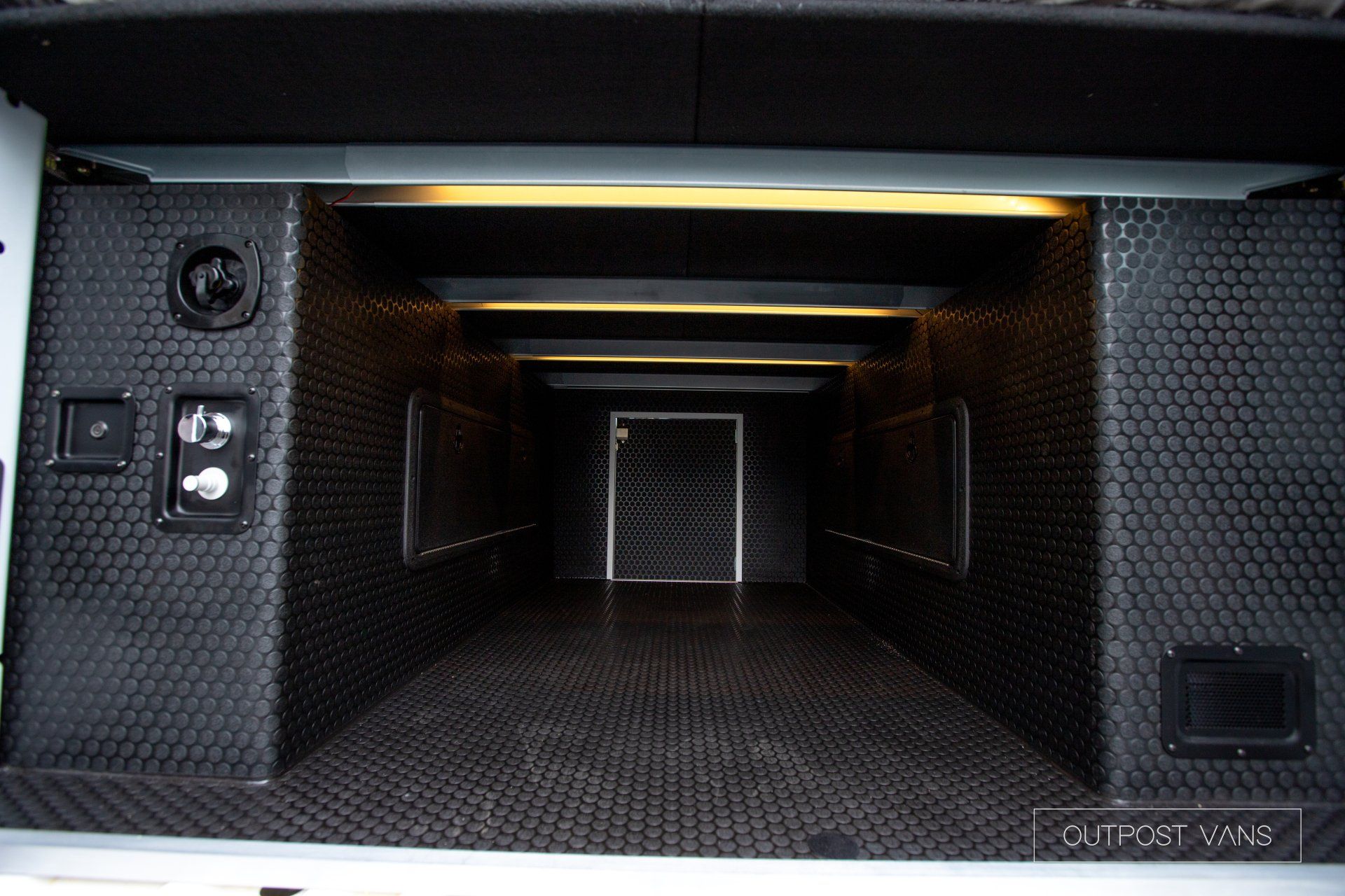 the inside of a truck with the door open