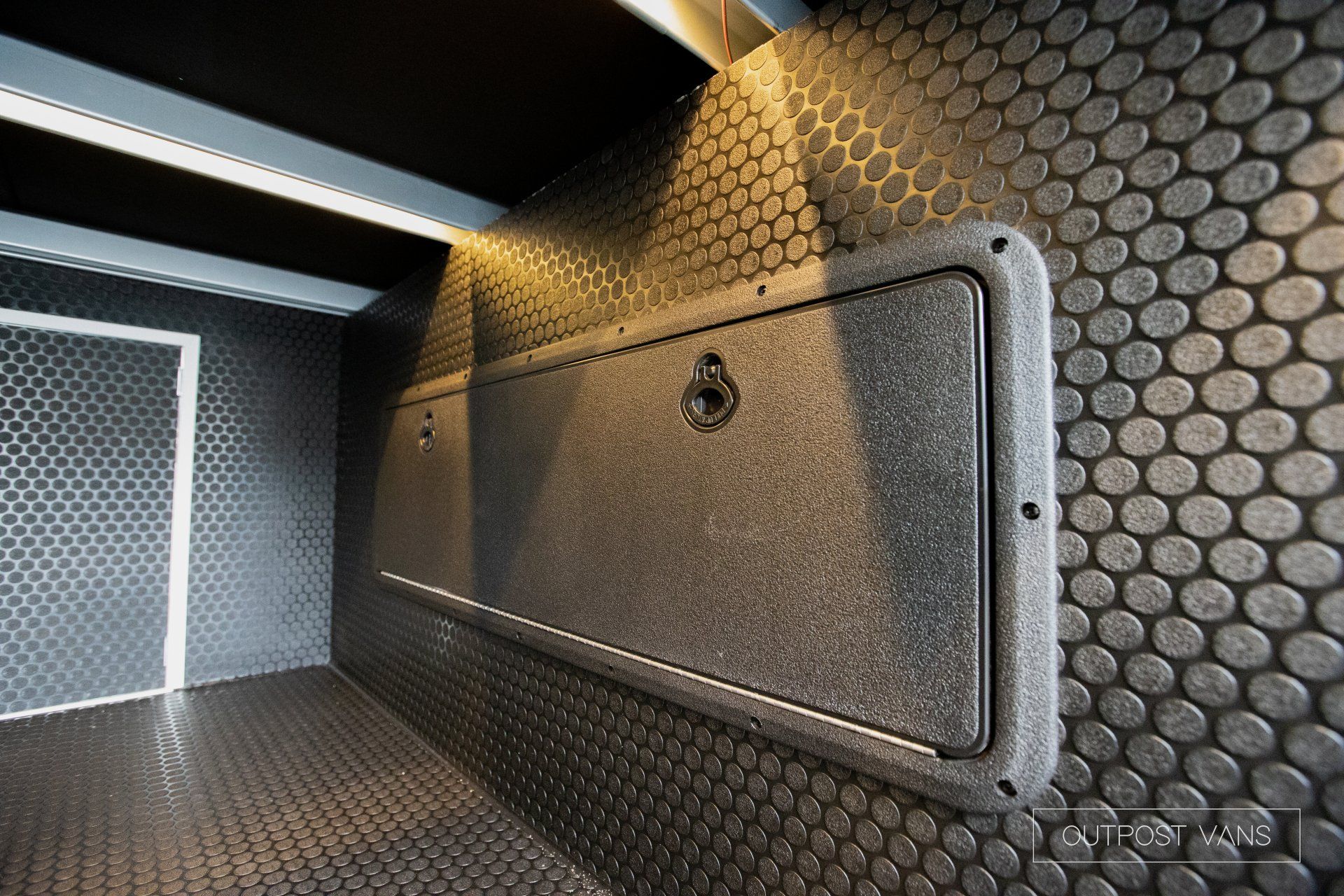 a close up of a door on a wall in a room .