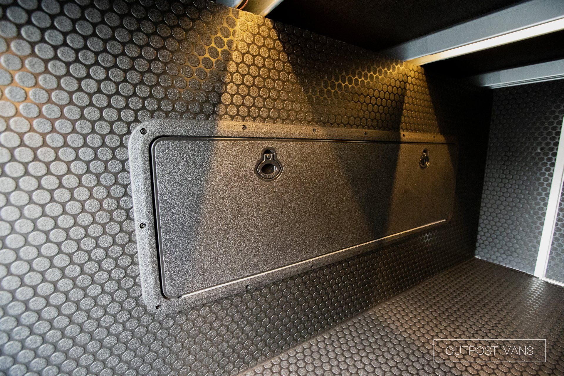 a close up of a door on a wall in a room .