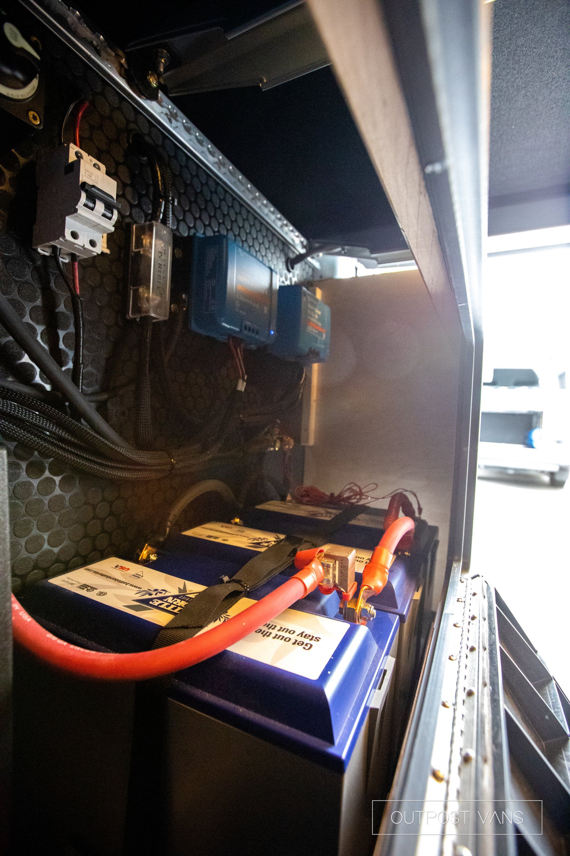a bunch of batteries are sitting inside of a vehicle .
