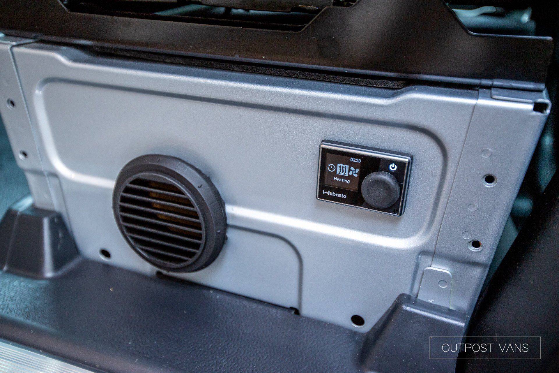 There is a heater in the back of a car.