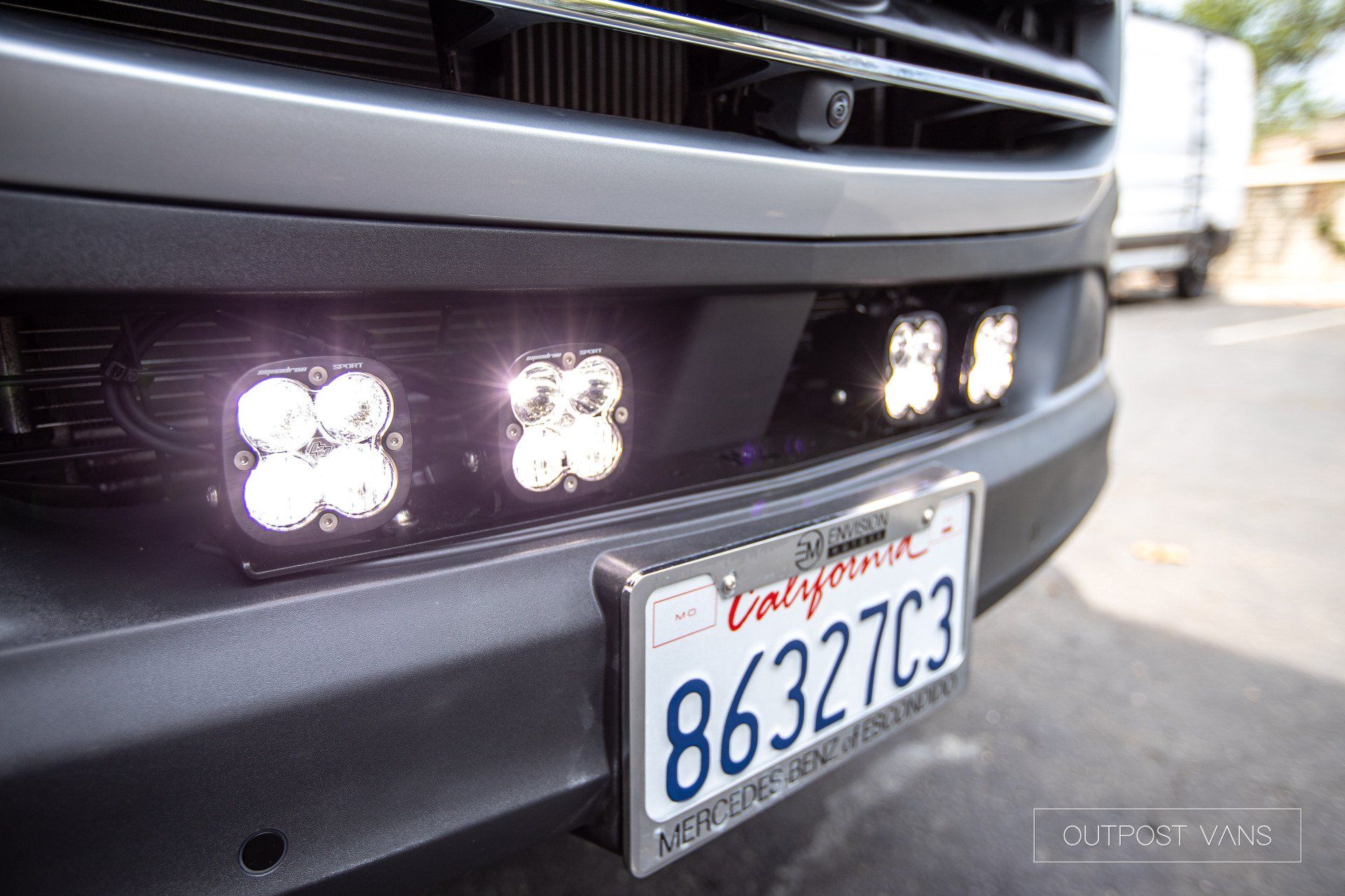 A close up of a car with a license plate that says 86327c3