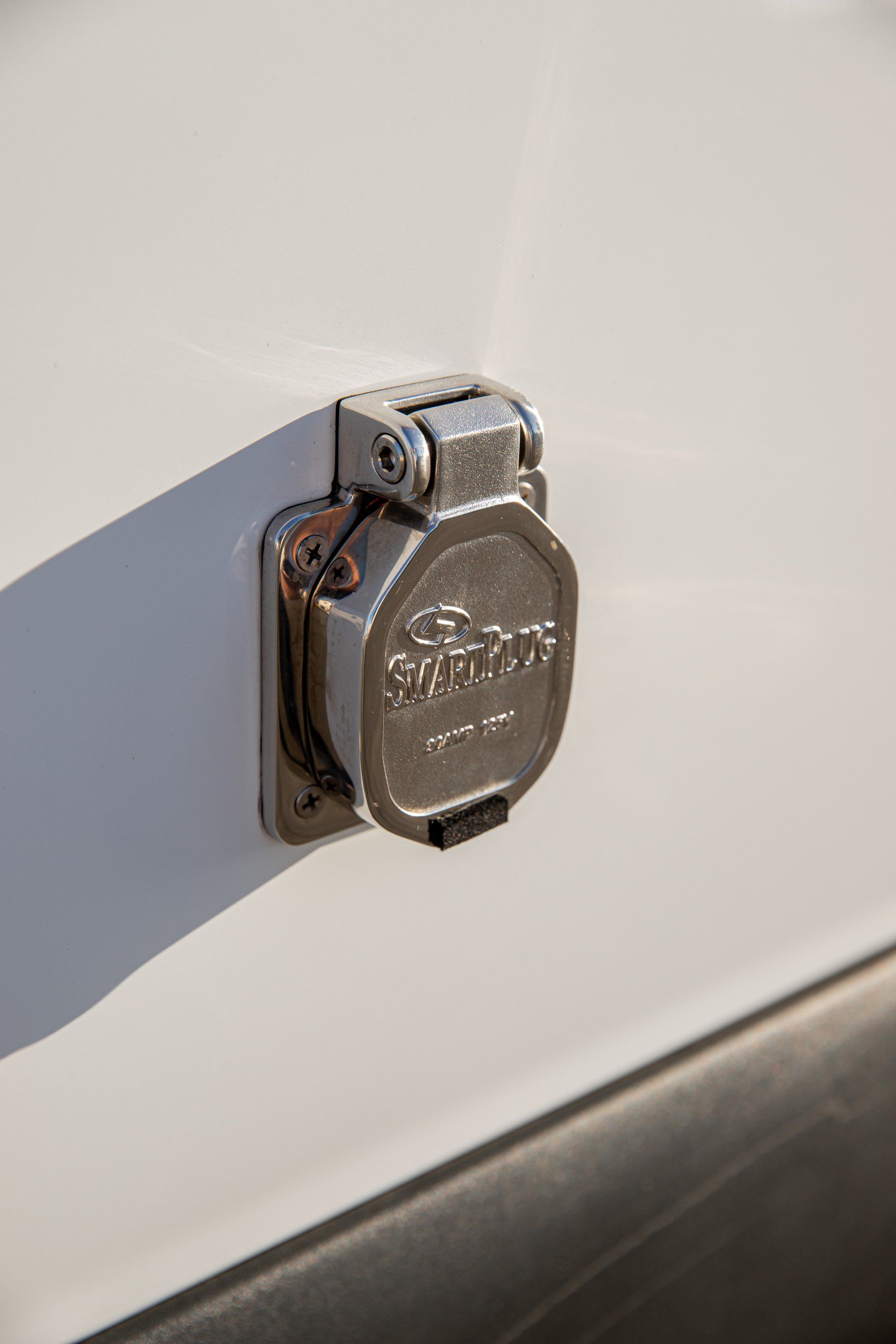 a close up of a plug on the side of a vehicle .