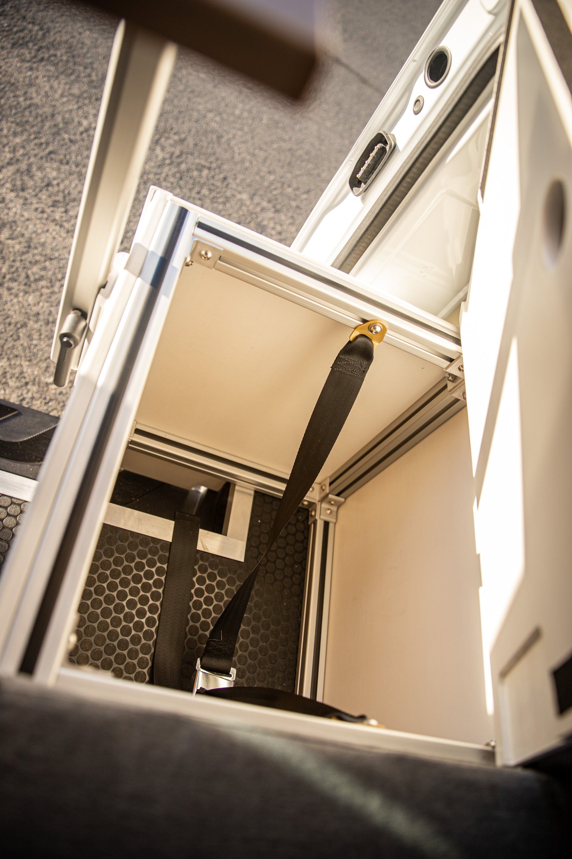 a close up of a box with a seat belt in it .