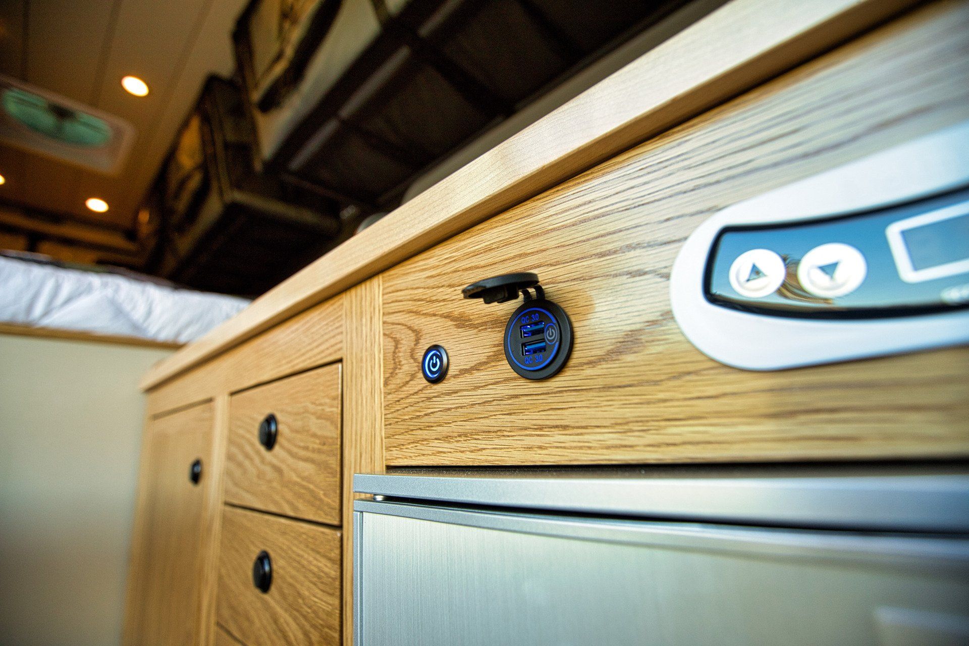A close up of a wooden cabinet with a lock on it.
