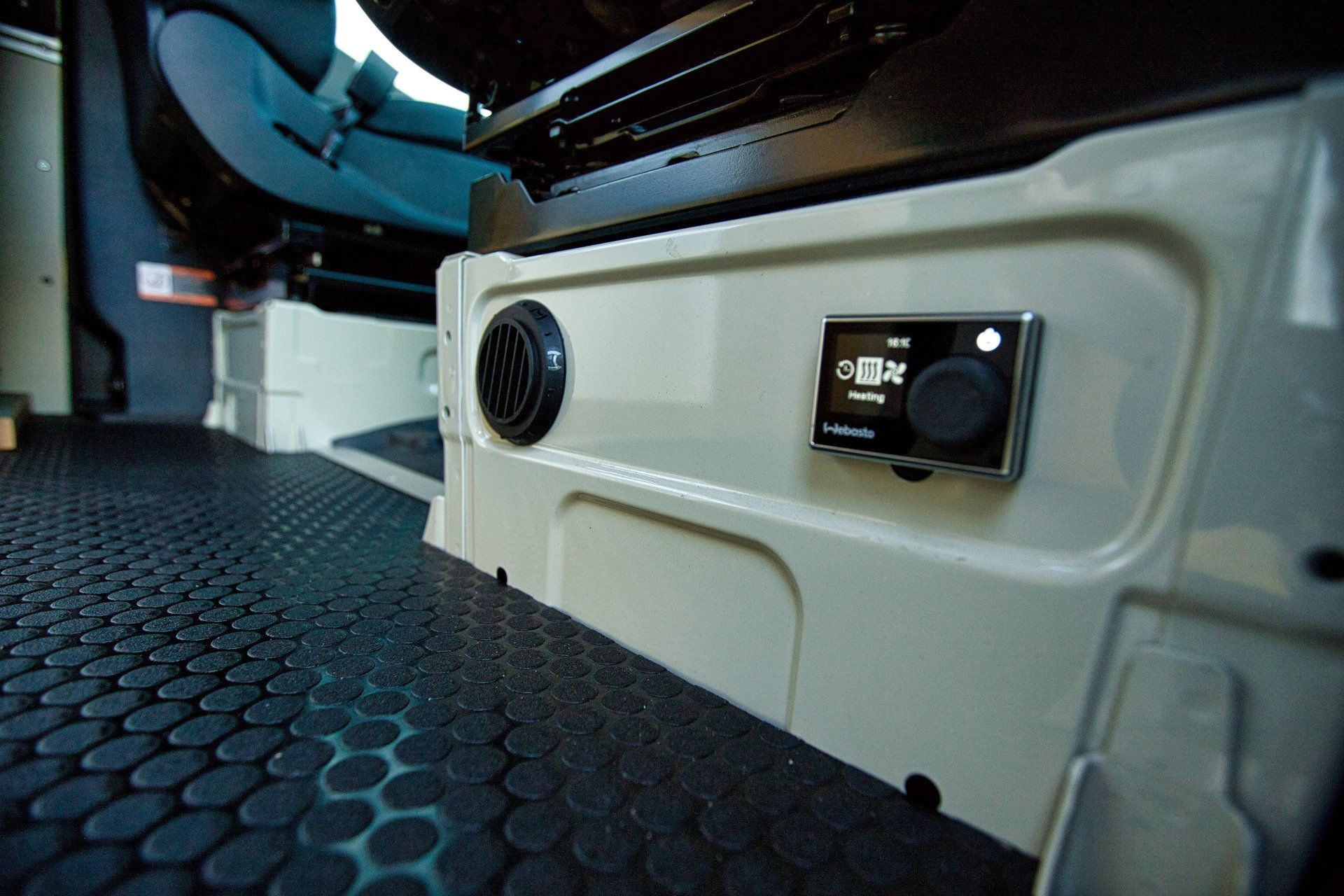 There is a heater in the back of a van.