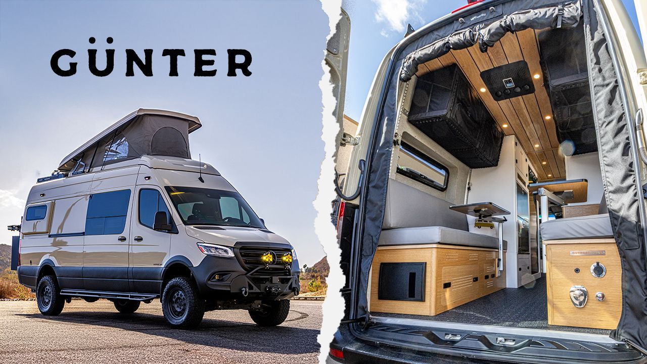 A white van with a pop up roof is parked on the side of the road.