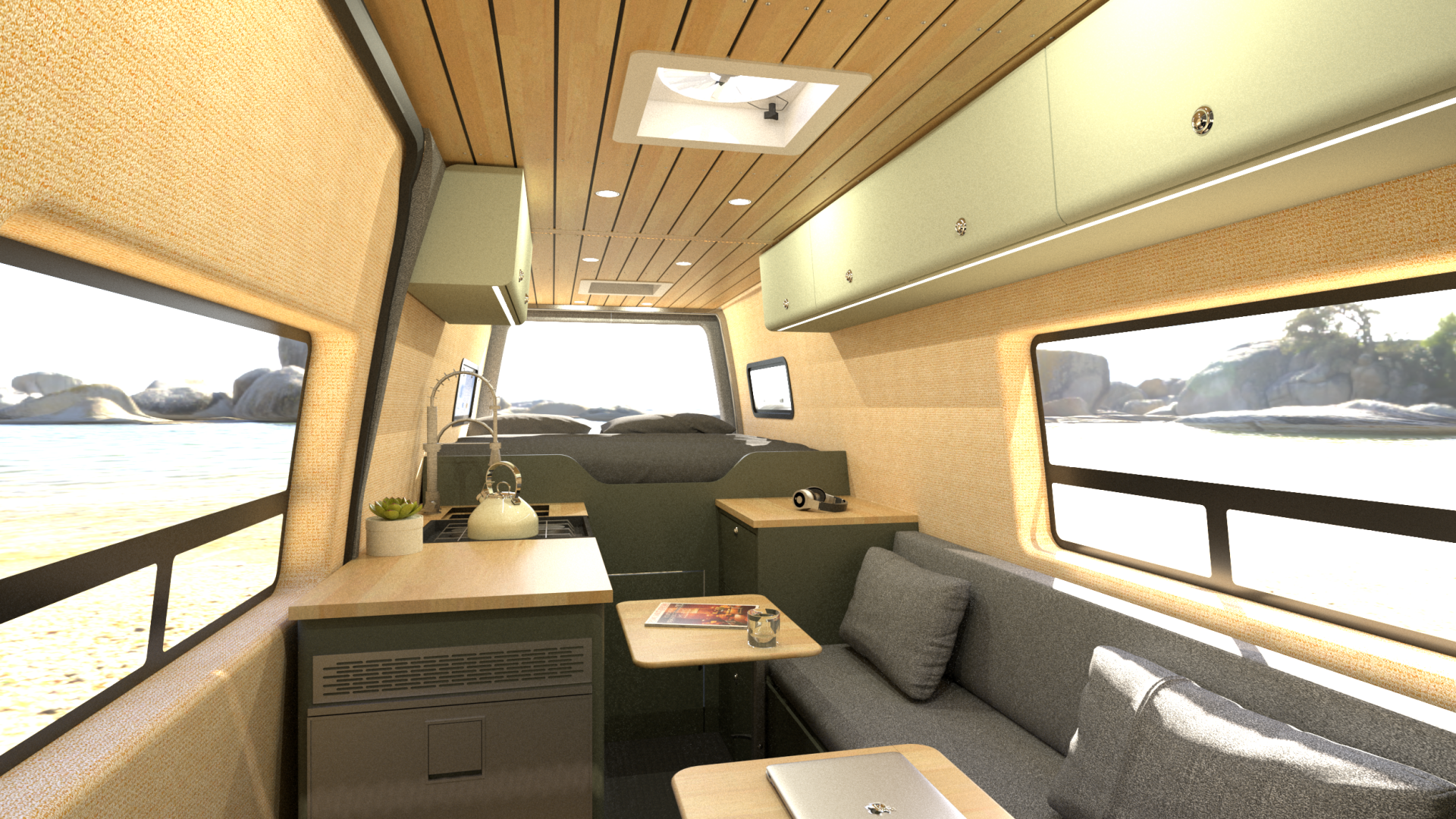the inside of a van with a couch , table , and window .