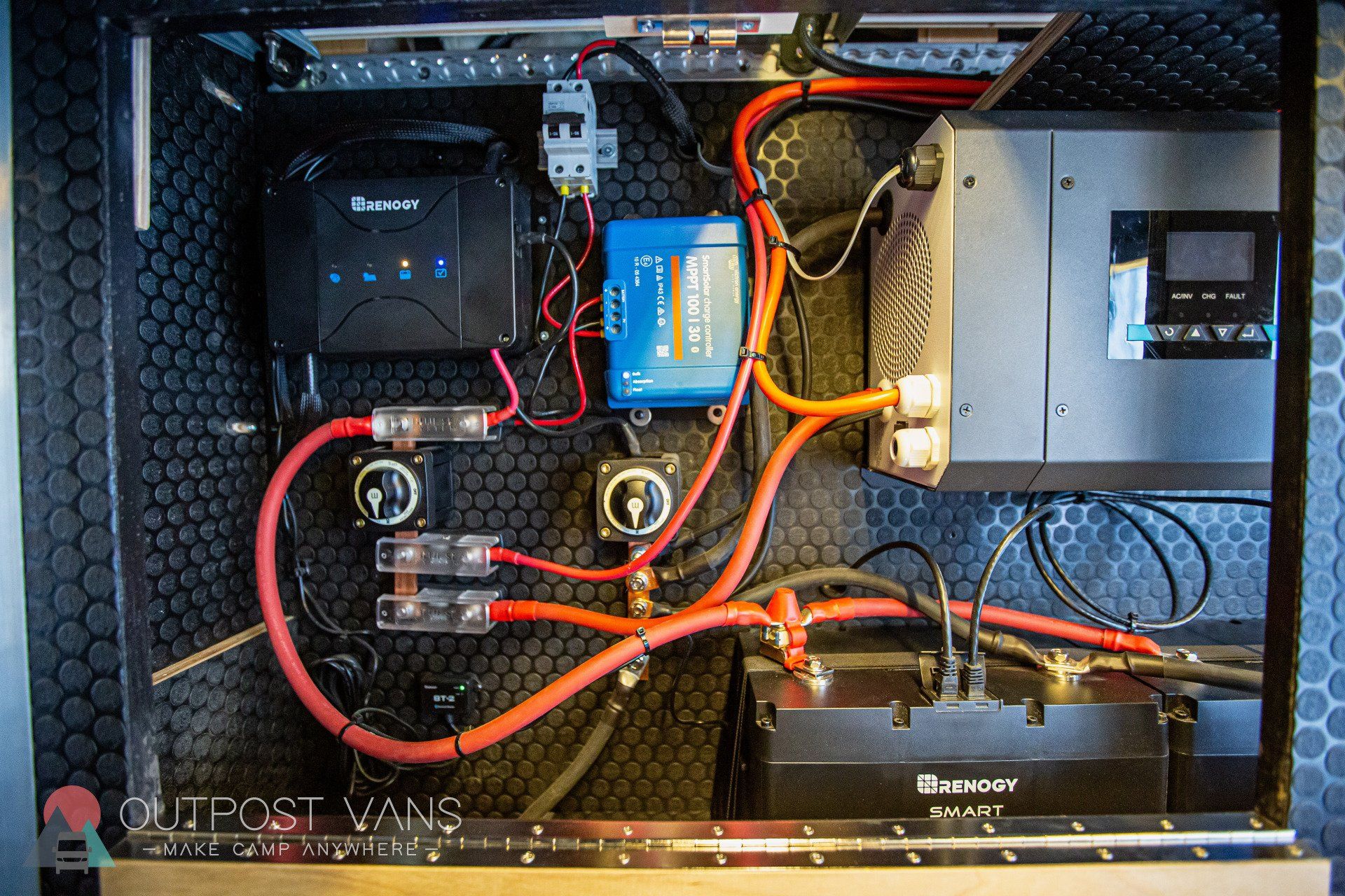 the inside of a van with a lot of wires and electronics .