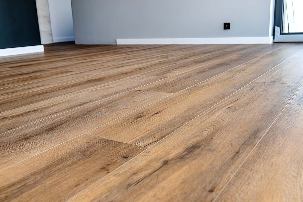 A Living Room With A Modern Wooden Flooring — Flooring Direct Mid North Coast in Kempsey, NSW