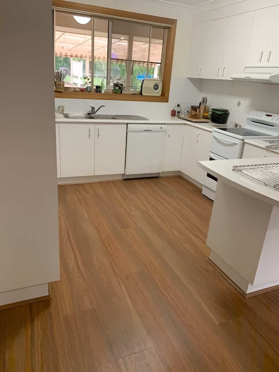A Kitchen Accented By Newly Laid Vinyl Flooring — Flooring Direct Mid North Coast in Wauchope, NSW