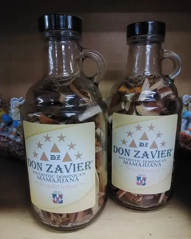 Two glass bottles labeled
