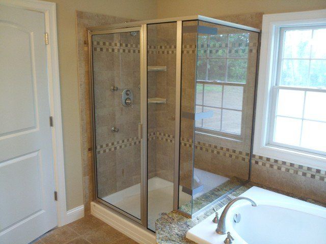 Box Framed Pivot Doors – Syracuse, NY – Luxury Glass