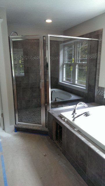 Framed Pivot Glass Door – Syracuse, NY – Luxury Glass