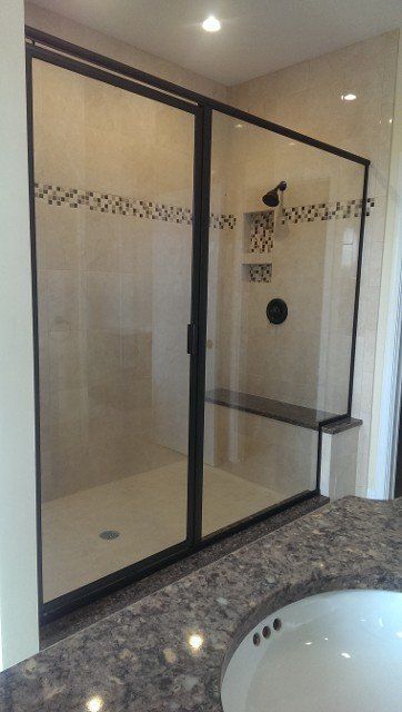 Black Framed Pivot Doors – Syracuse, NY – Luxury Glass