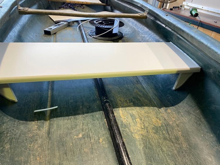 The Inside of a Boat With a Table and a Remote Control — Bent Plastics in Kunda Park, QLD