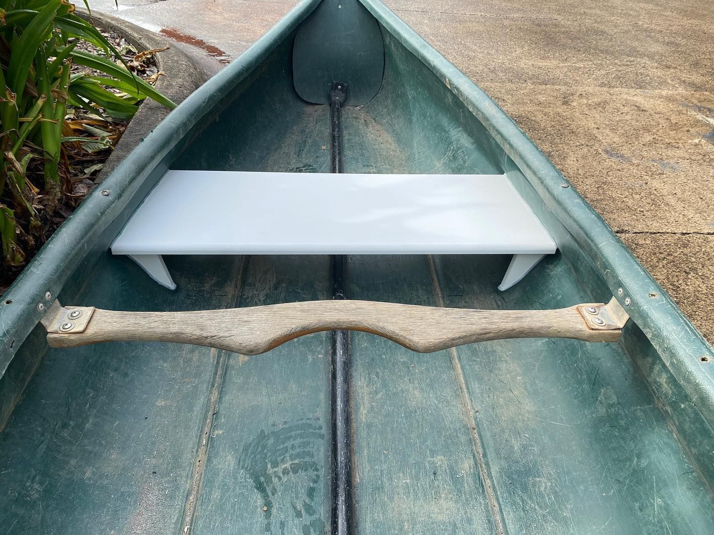 A Green Canoe With a White Shelf in the Back — Bent Plastics in Kunda Park, QLD