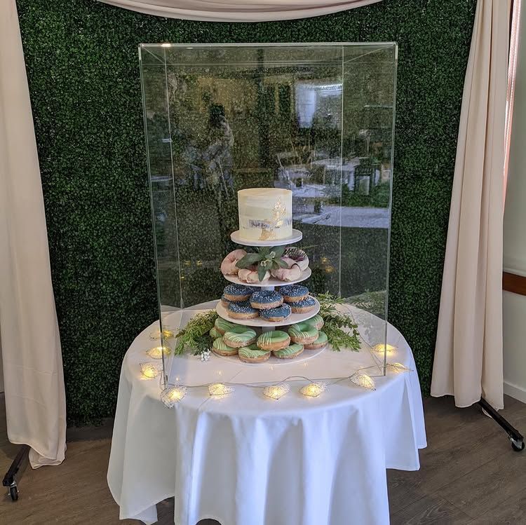 A Table With a Display of Donuts and Candles on It — Bent Plastics in Kunda Park, QLD