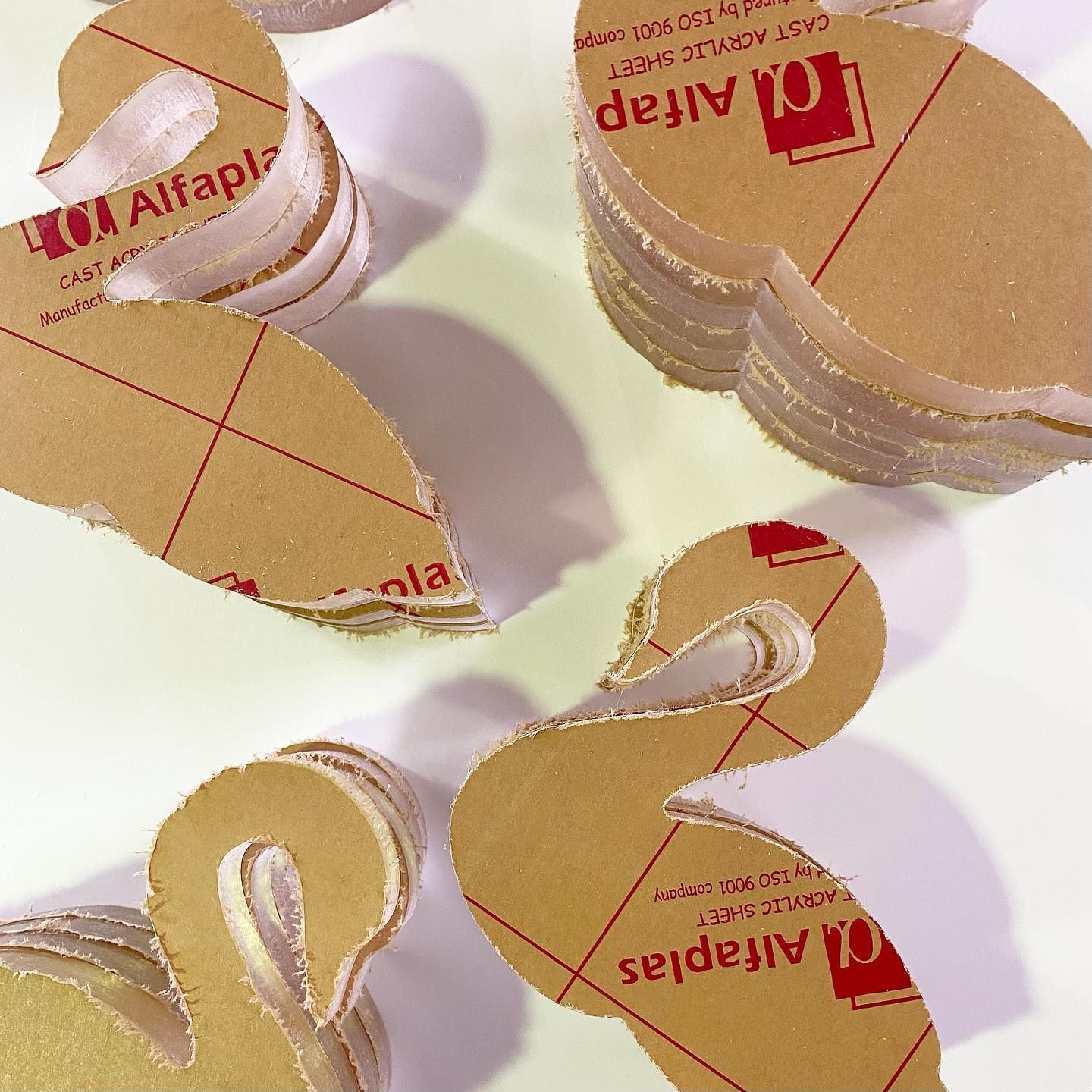 Several Pieces of Acrylic Are Stacked on Top of Each Other — Bent Plastics in Kunda Park, QLD