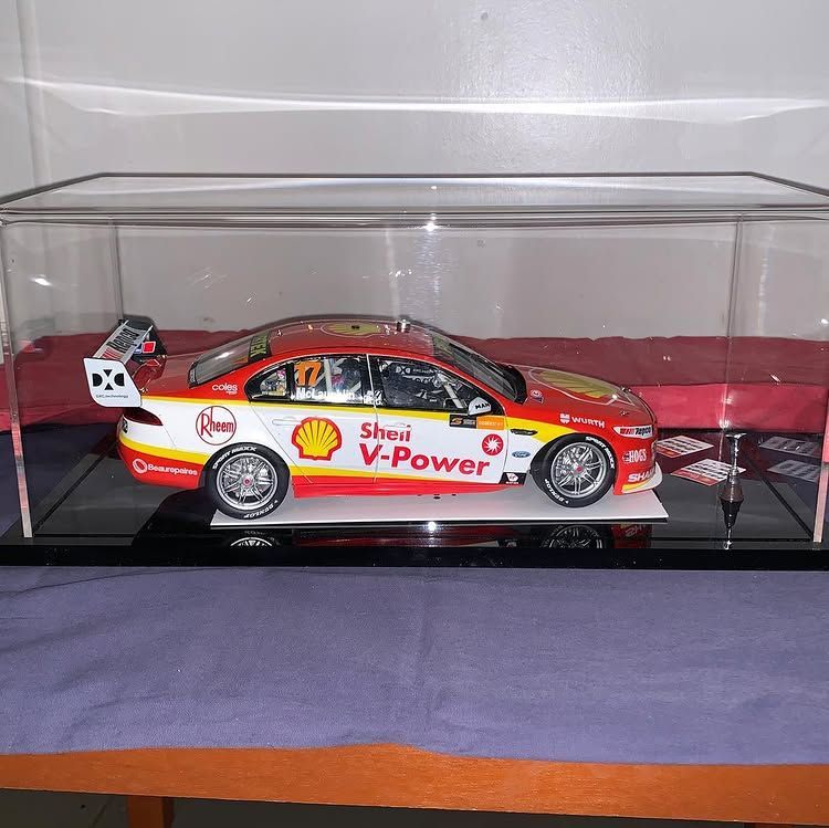 A Shell v-power Car is in a Glass Case — Bent Plastics in Kunda Park, QLD